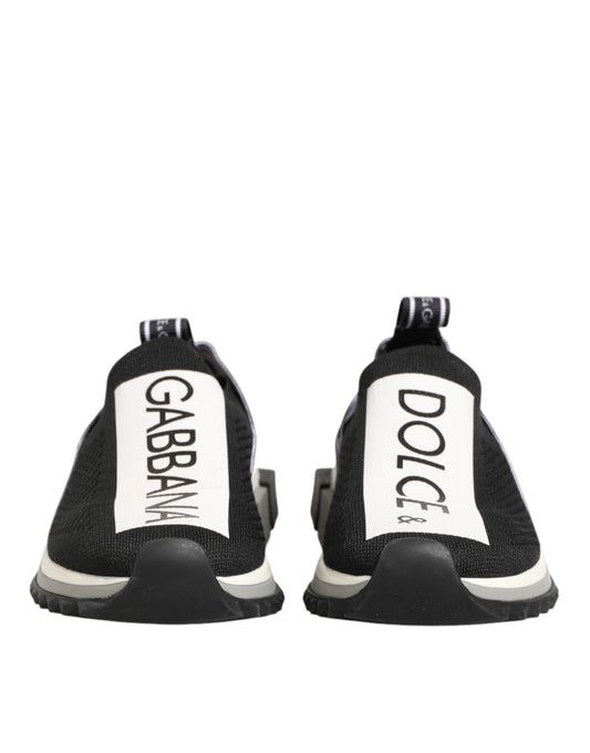 Pair of black sneakers with white soles