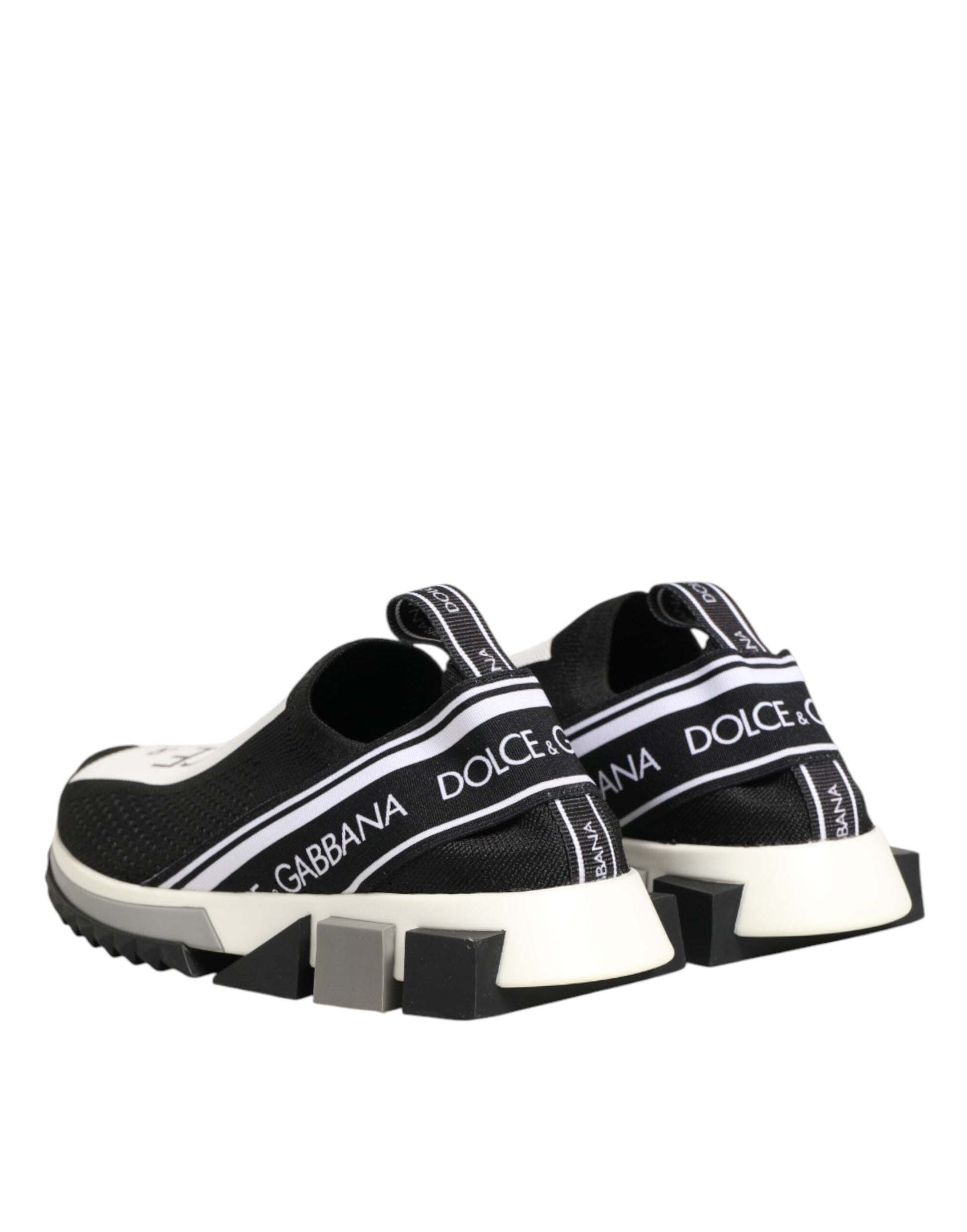 Pair of black sneakers with white stripes on sides