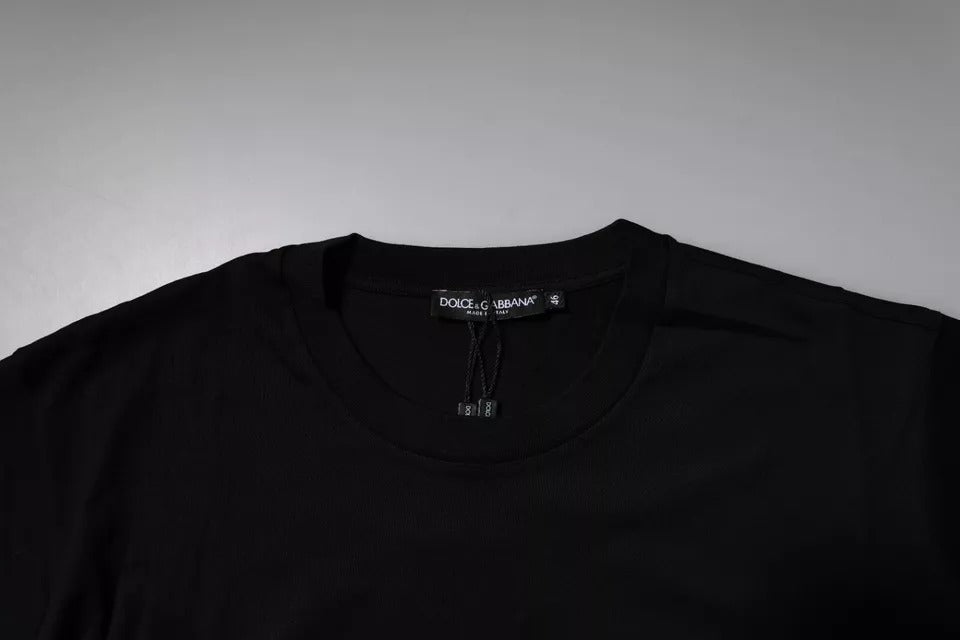 Black t-shirt on hanger