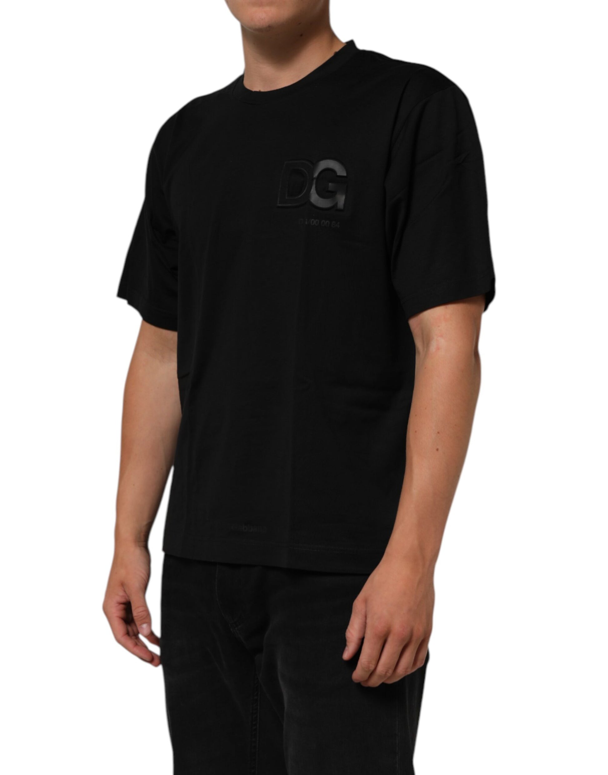 A black crew neck t-shirt with a logo patch on the chest