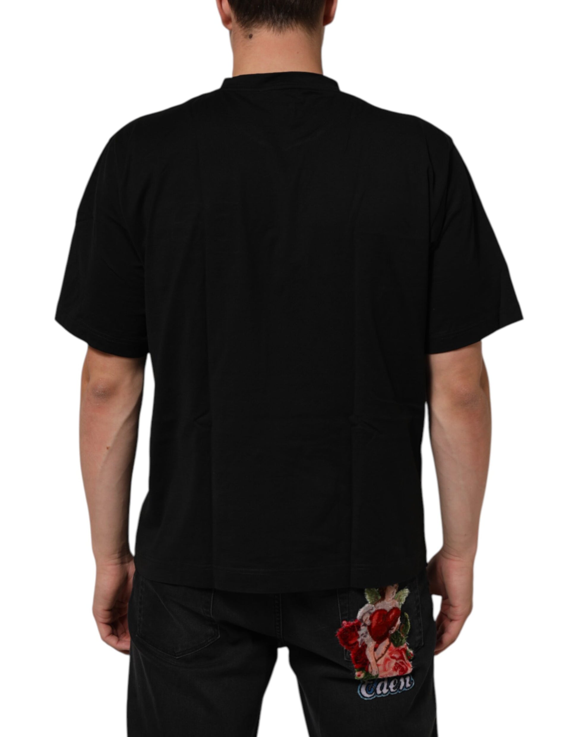 A black crew neck t-shirt with a logo patch on the back