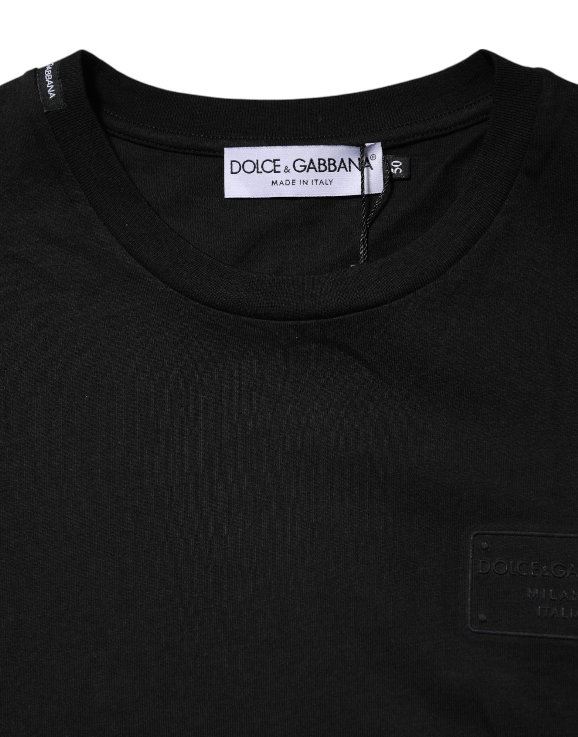 Black turtleneck sweater with ribbed neckline and cuffs