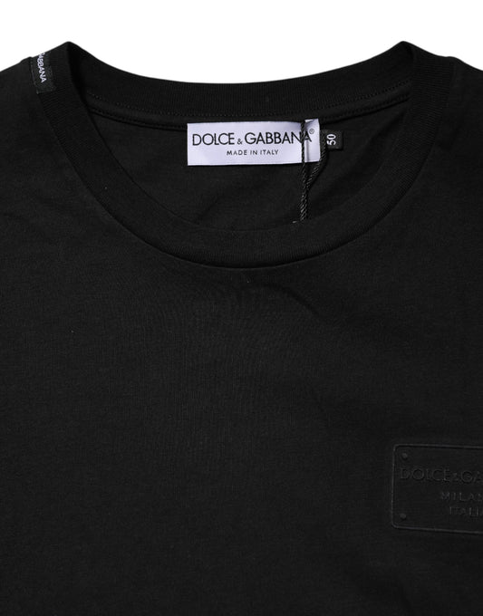 Black turtleneck sweater with ribbed neckline and cuffs