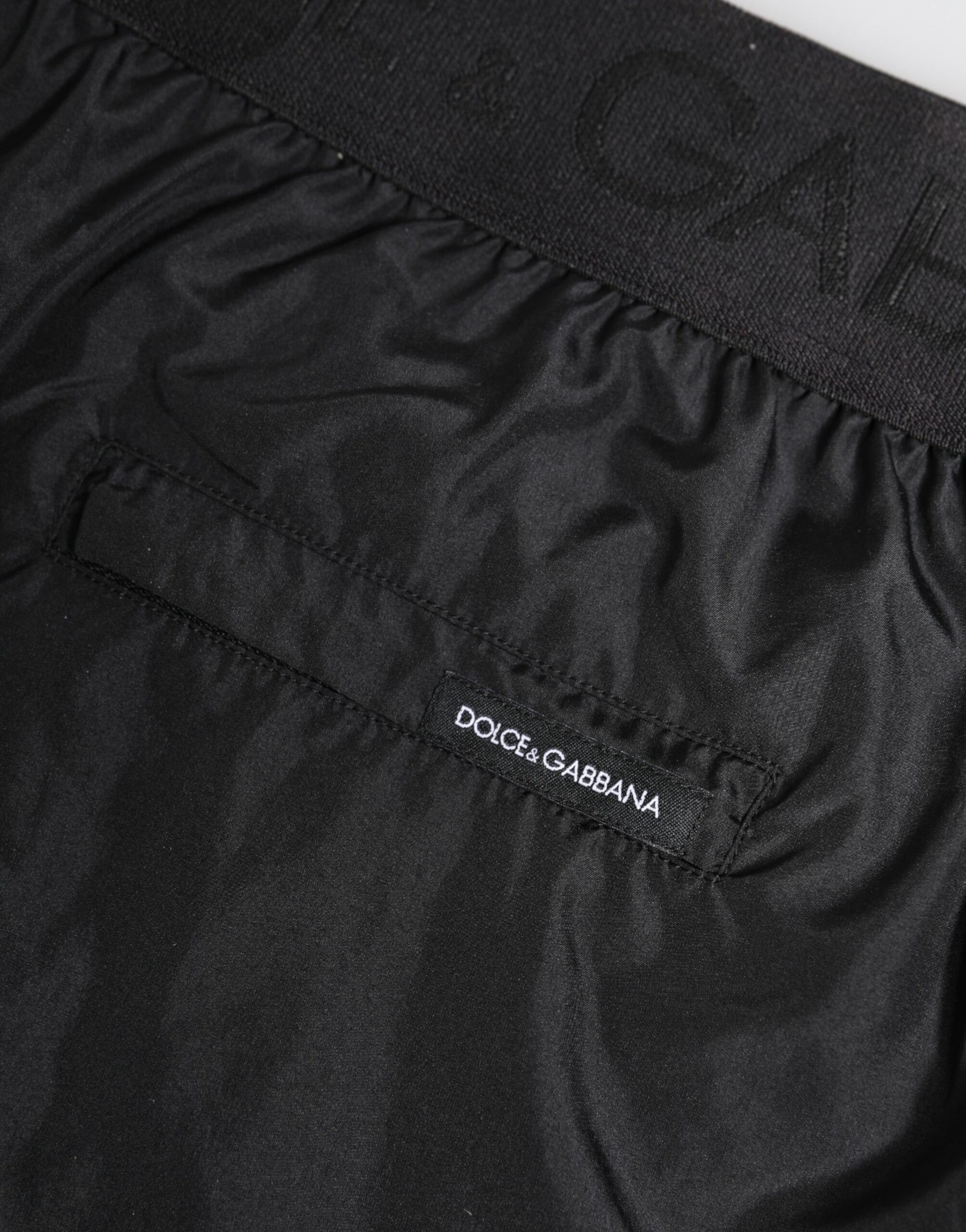 Black pair of boxer shorts with brand name on waistband