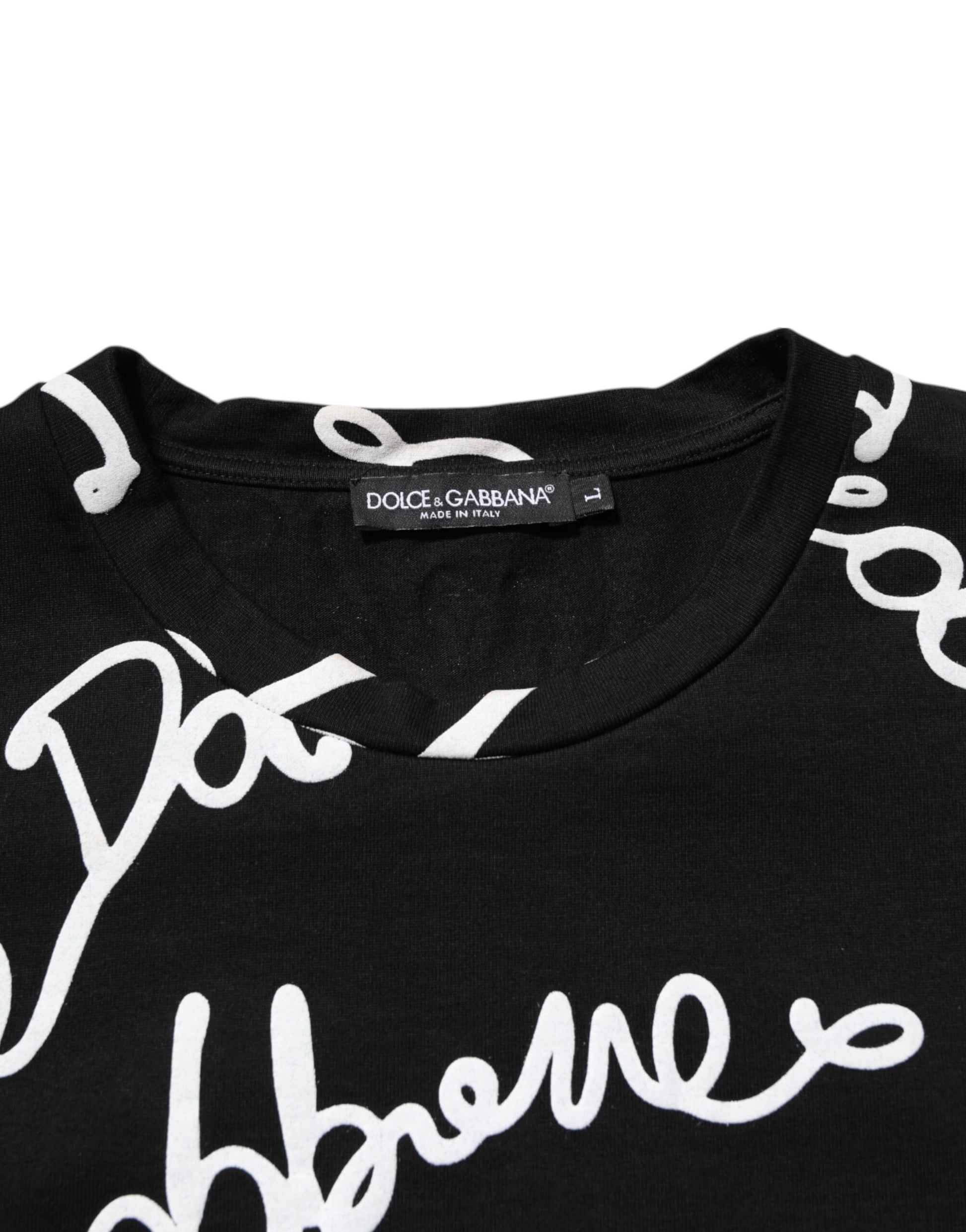 Black t-shirt with white cursive writing