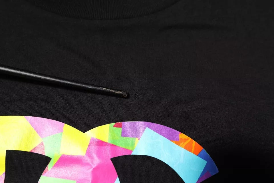Black t-shirt with colorful graphic design on front