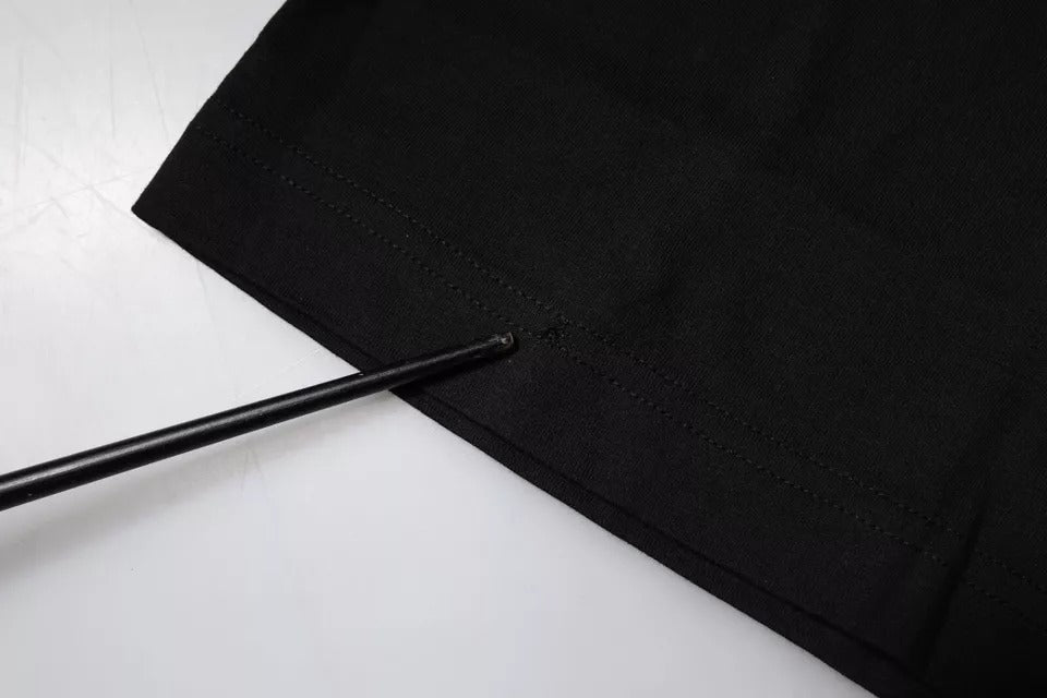 Black fabric with a hole in it