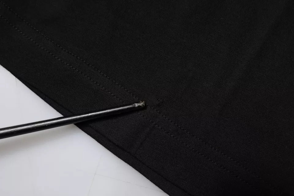 Black fabric with a hole in it