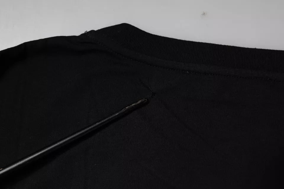 Black fabric with a small black object on top