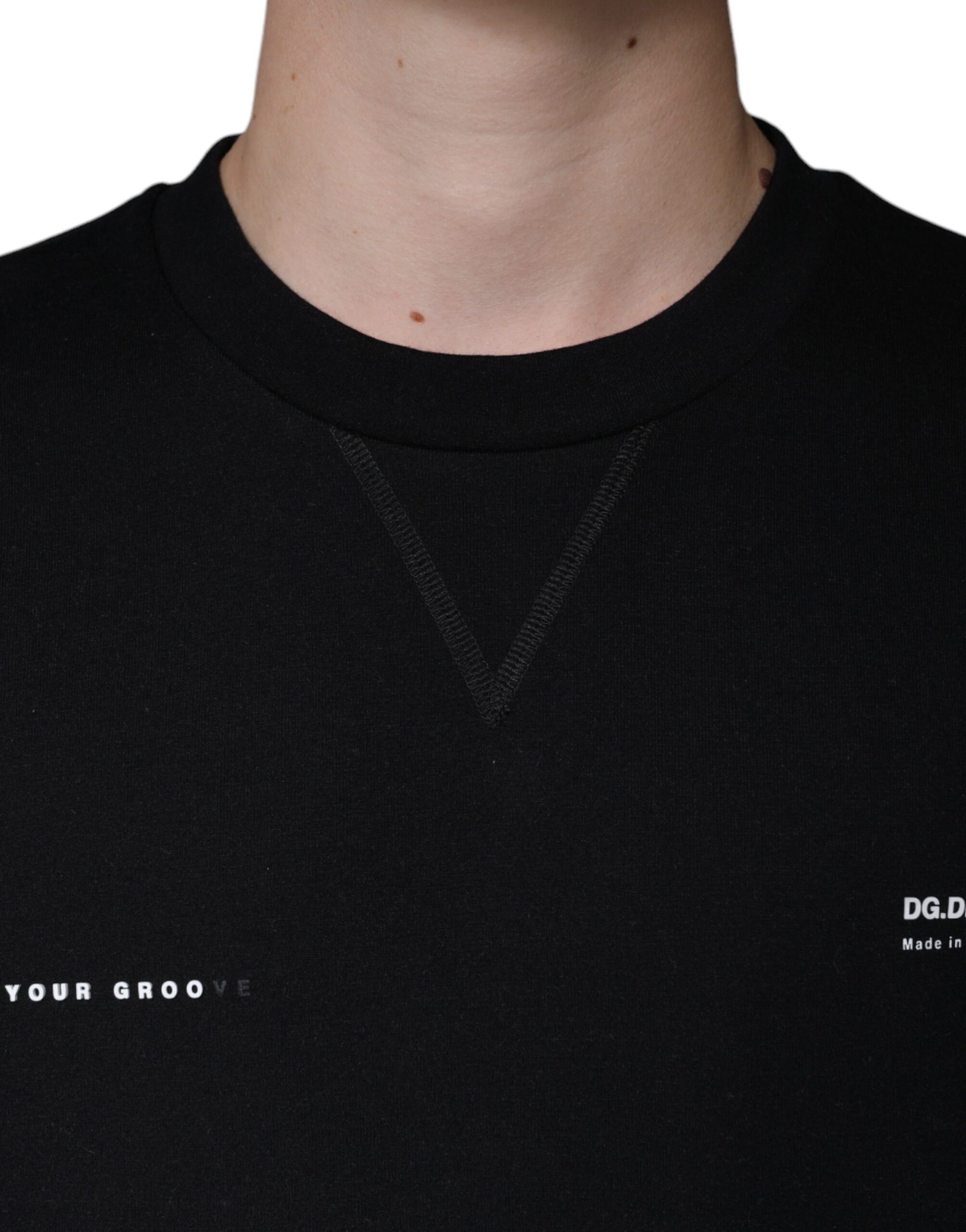 Black sweater with white lettering on front
