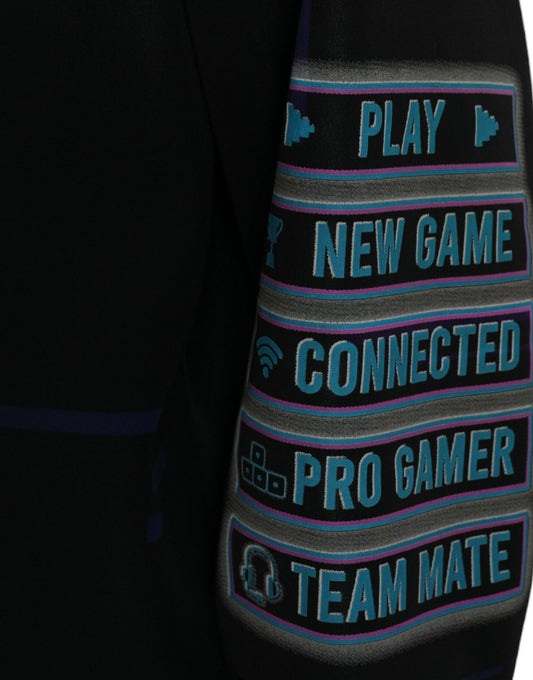Blue embroidered patch on a black jacket reading "Play new game connected pro gamer team mate"