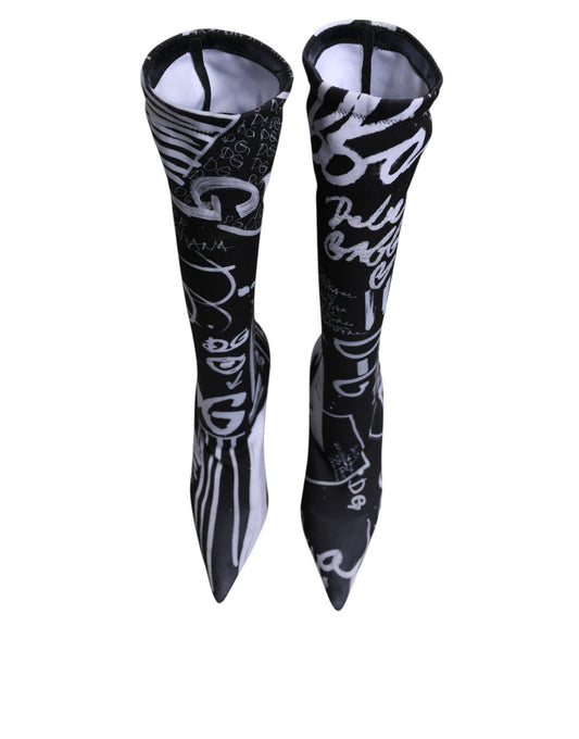 Pair of black socks with white writing
