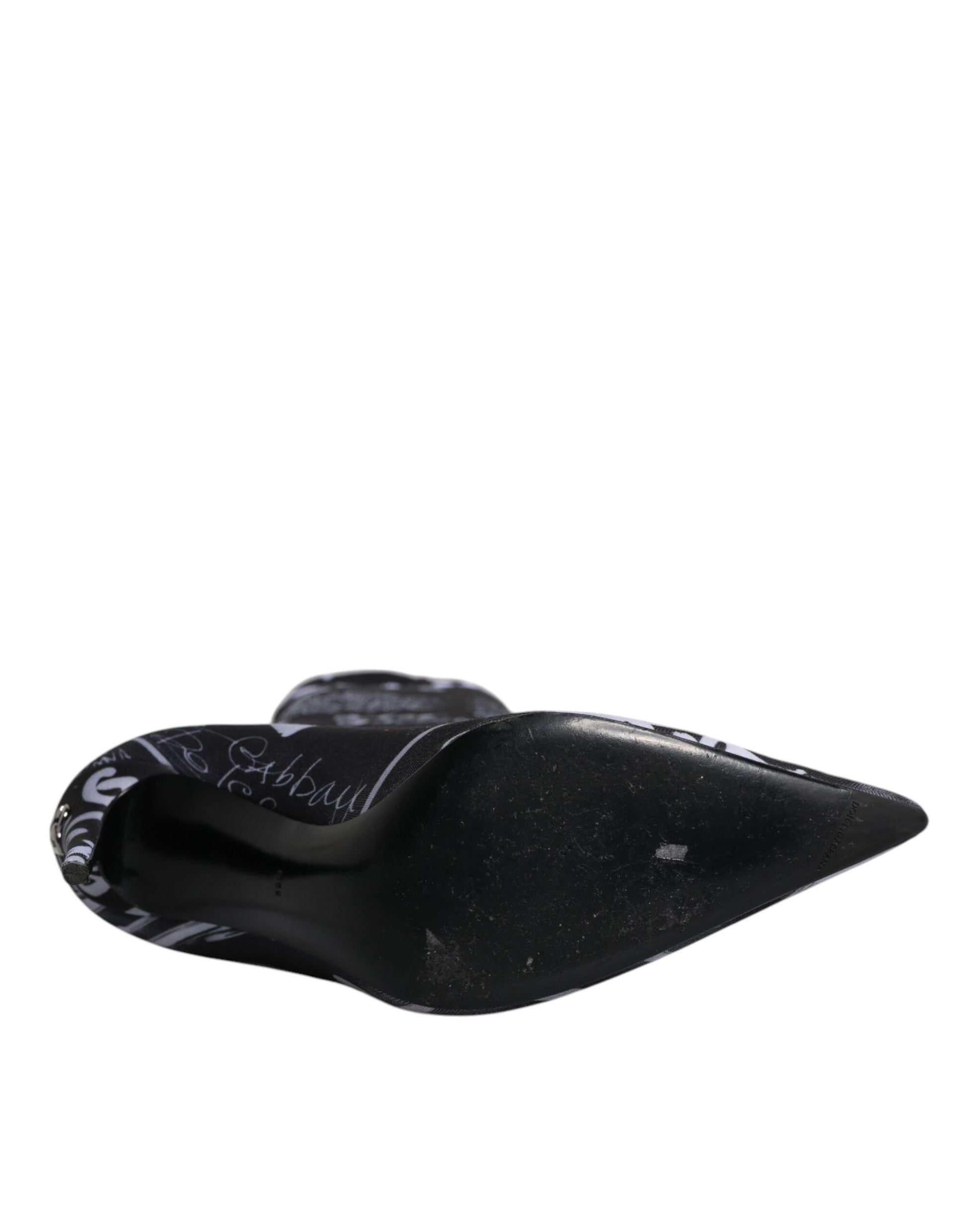 Black mouse on white surface