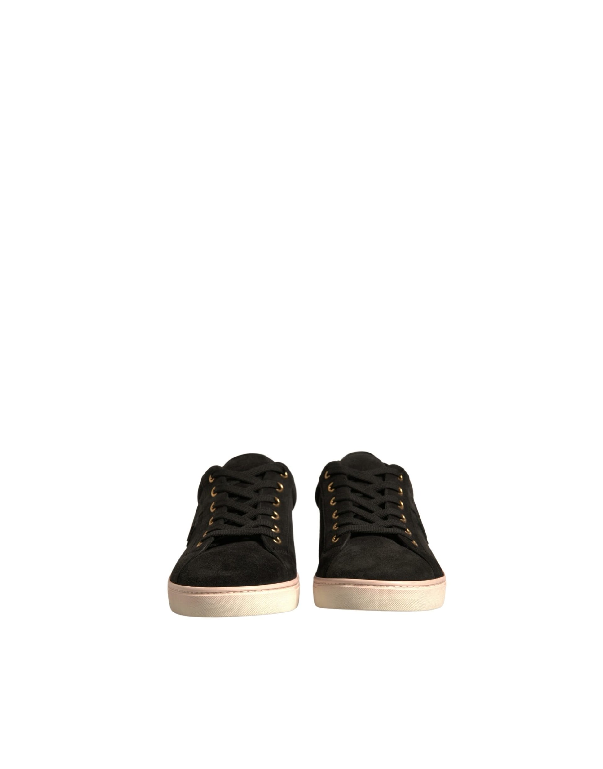 Pair of black sneakers with white soles