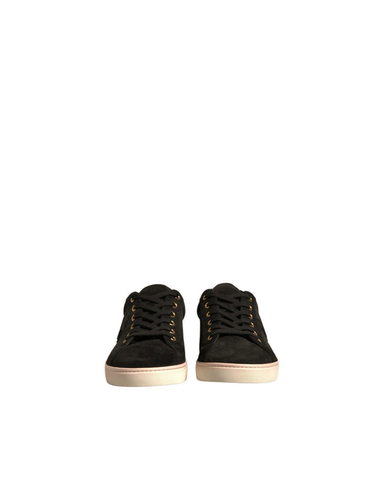 Pair of black sneakers with white soles