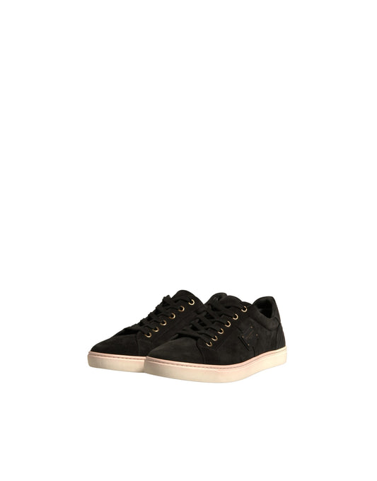 Black sneakers with gold laces
