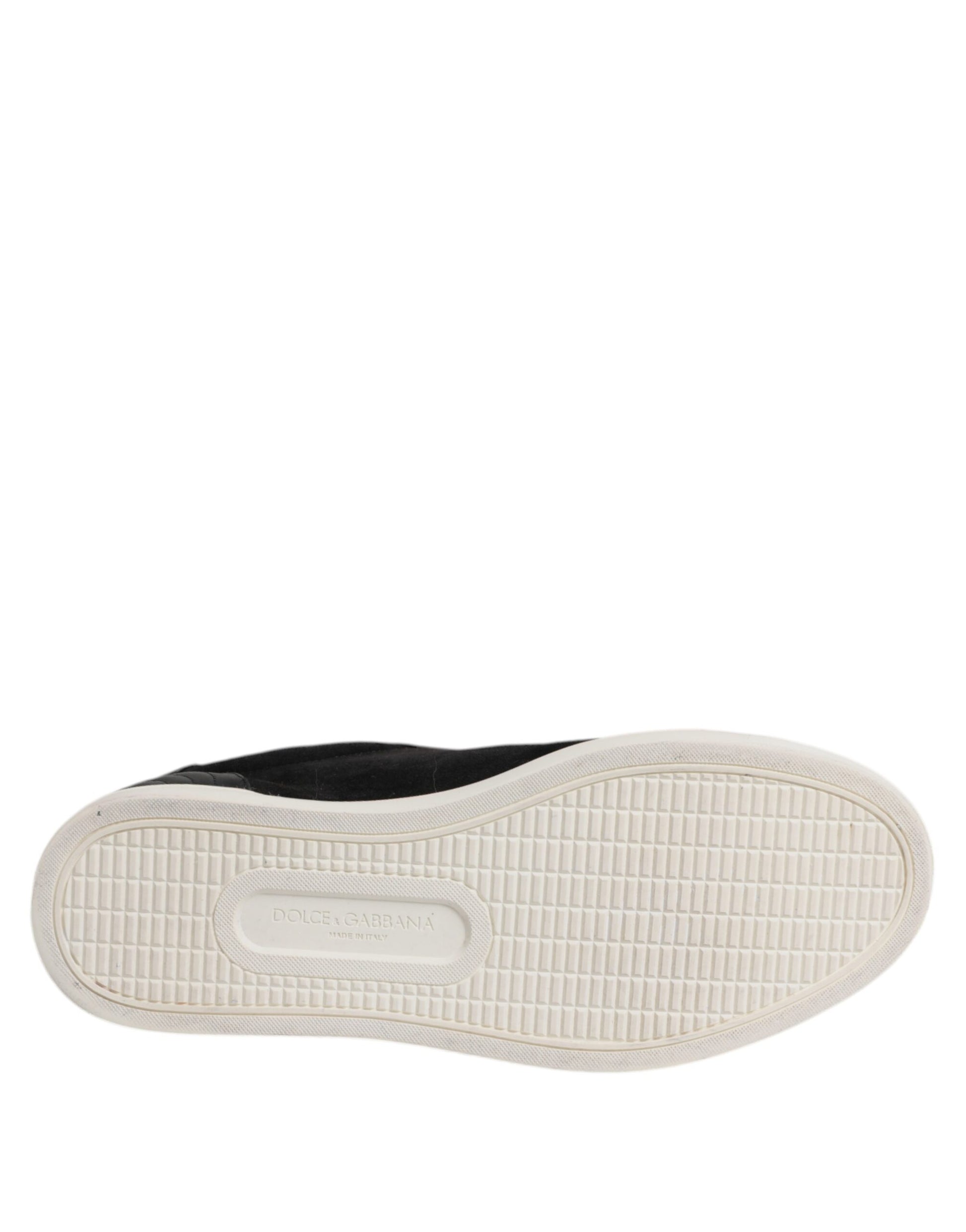 White sneaker with black sole