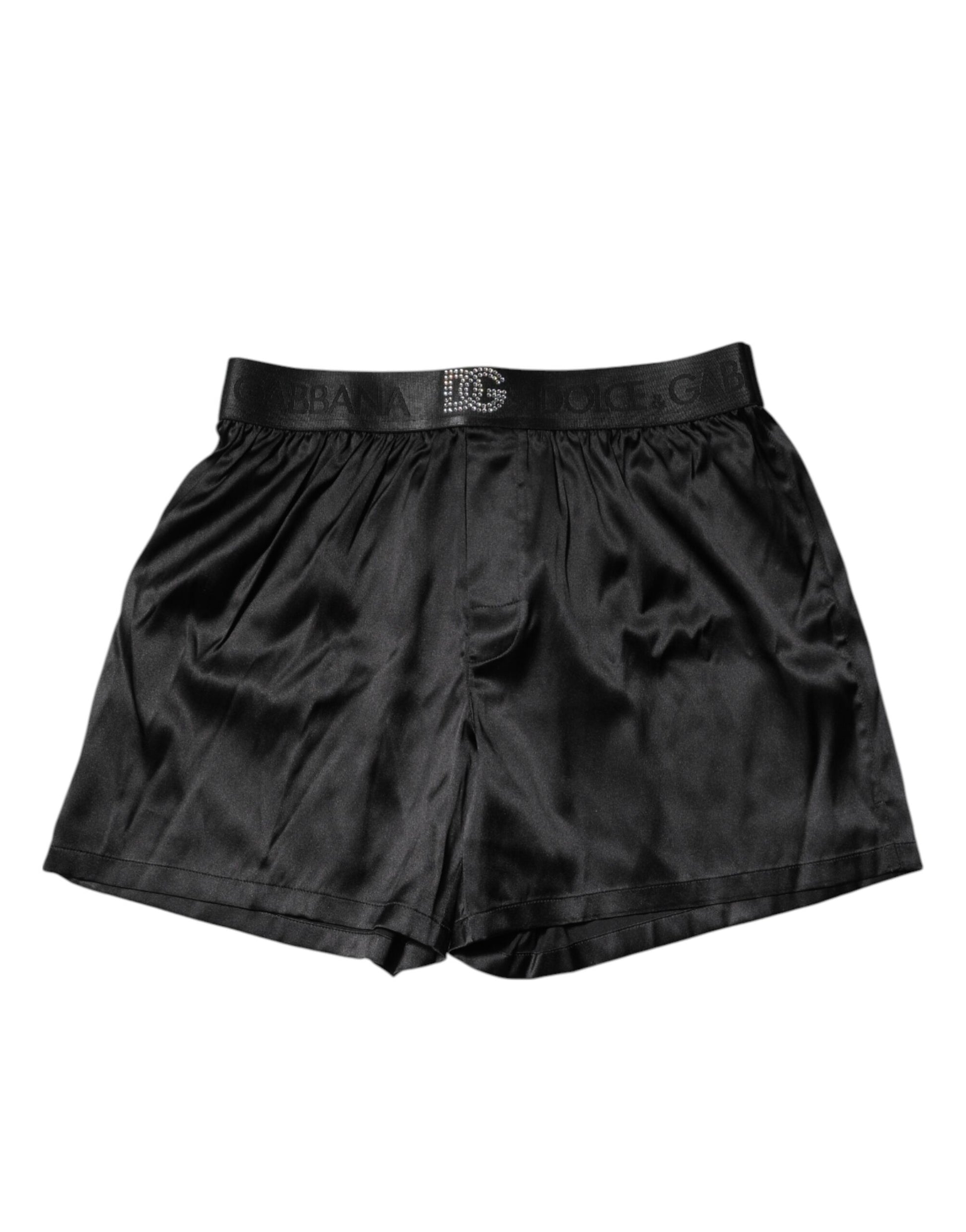 Black velvet shorts with ruffled hem