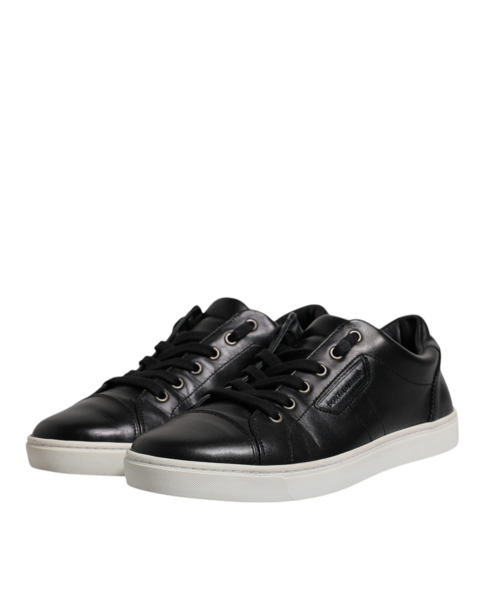 Black leather sneakers with white soles