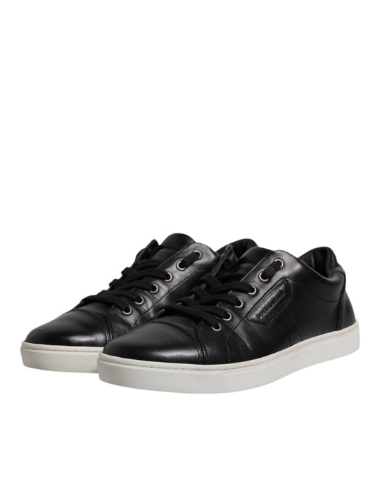 Black leather sneakers with white soles