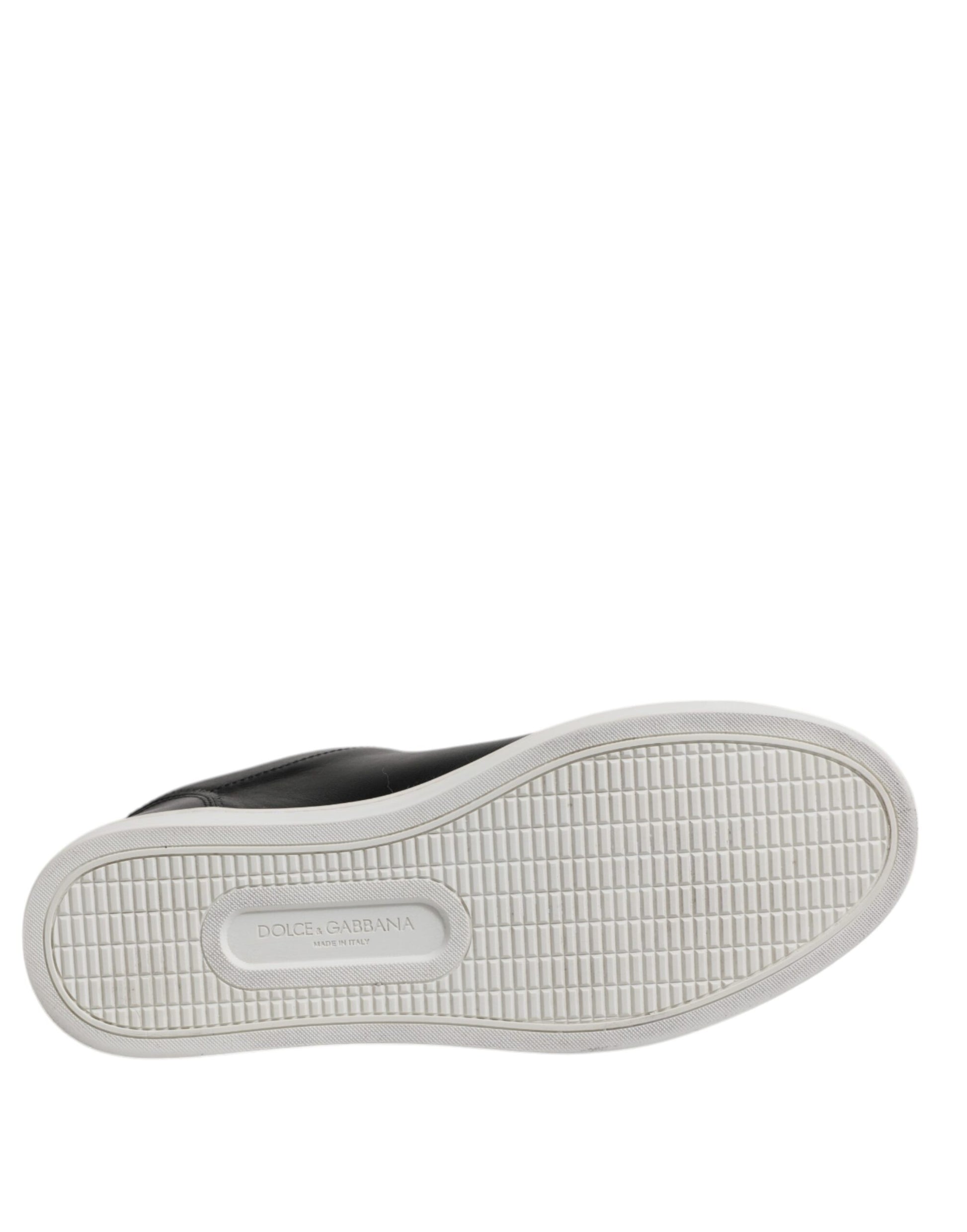 White sneaker with black sole