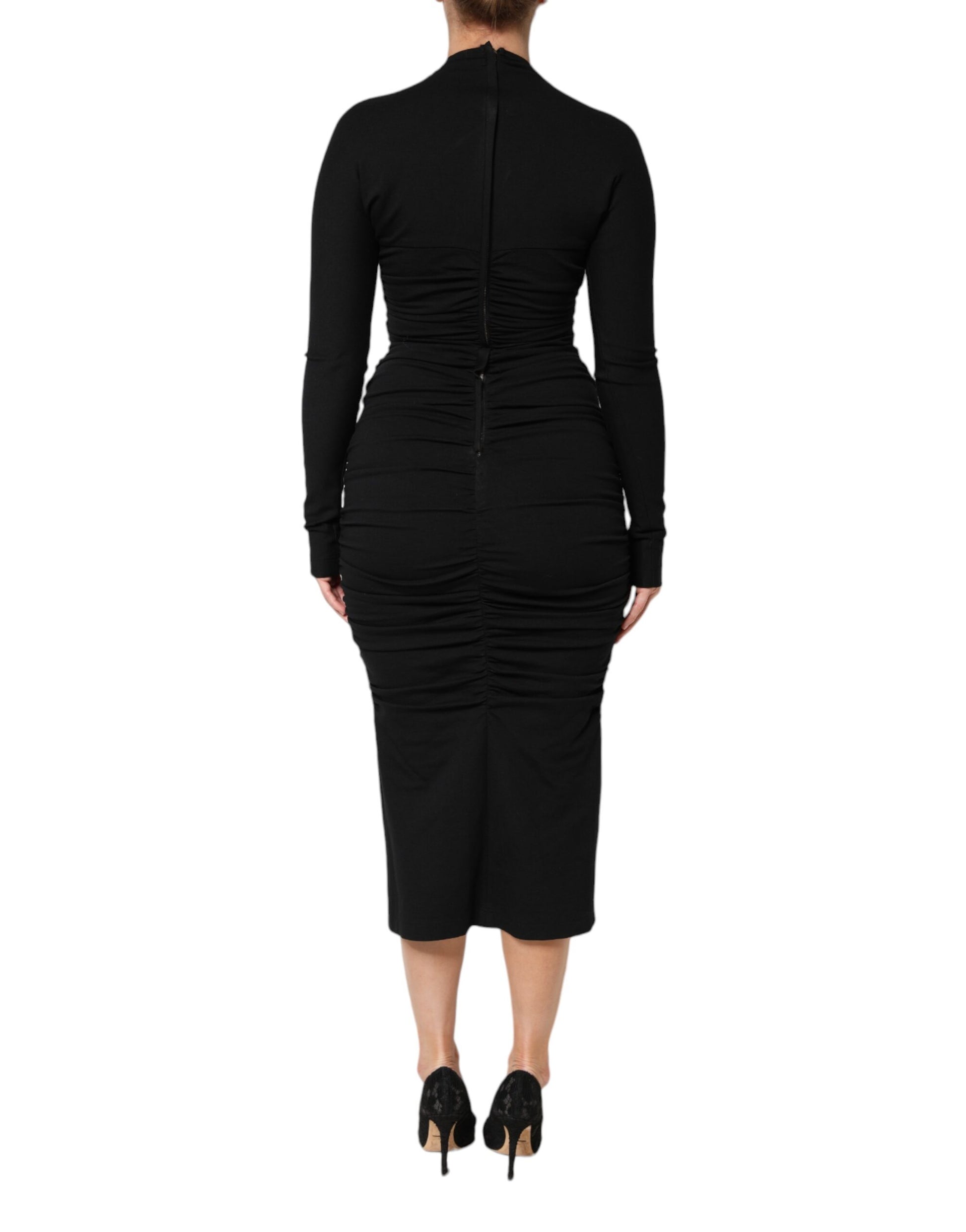 A black midi dress with long sleeves, sheath style, from the brand Dolce & Gabbana