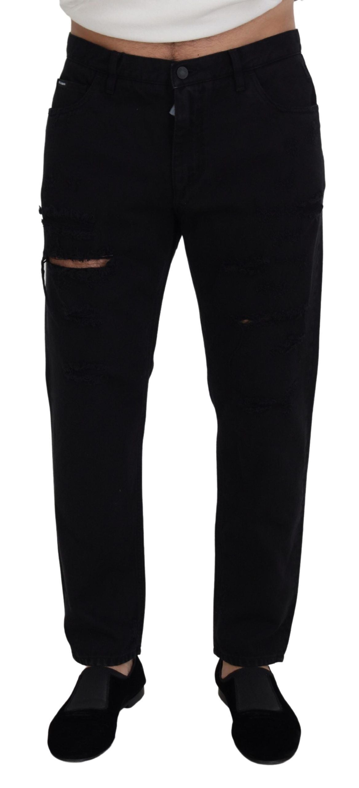 Pair of black pants with distressed knees