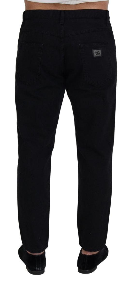 Pair of black pants with a white label on waistband