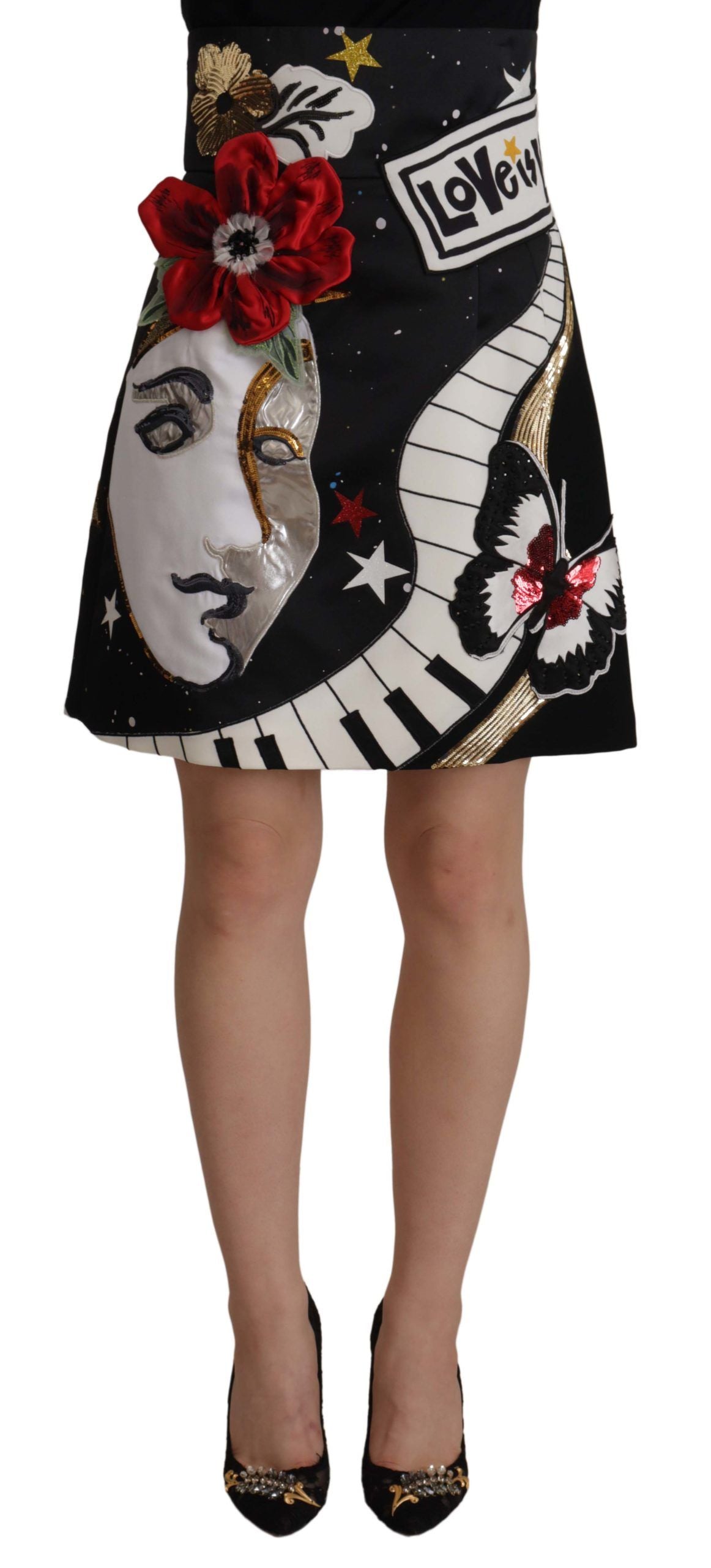 Black skirt with floral pattern featuring a woman's face