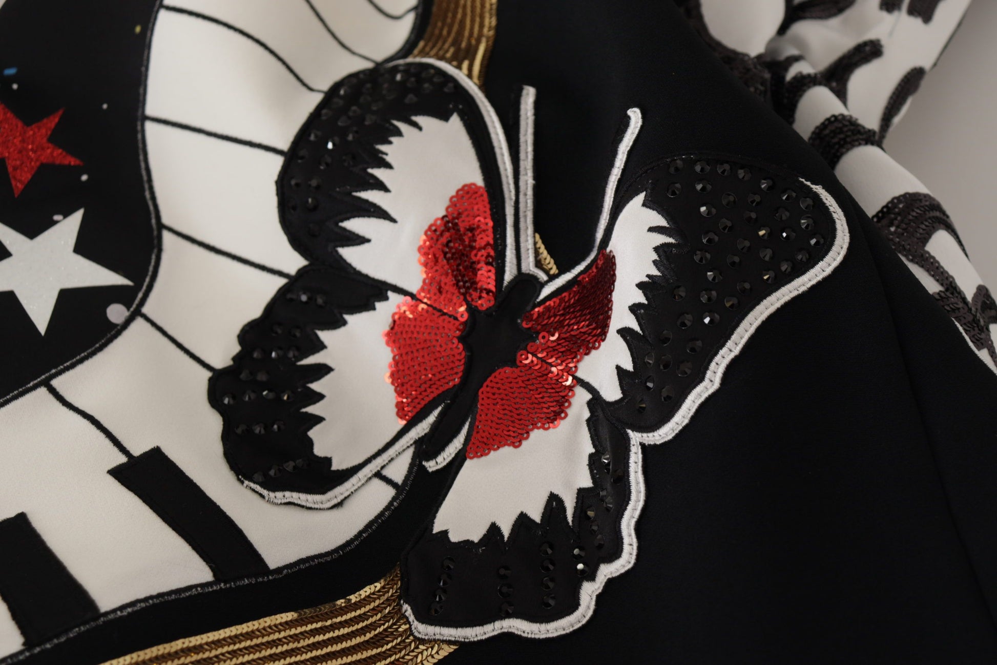 Black and white butterfly embroidery on fabric