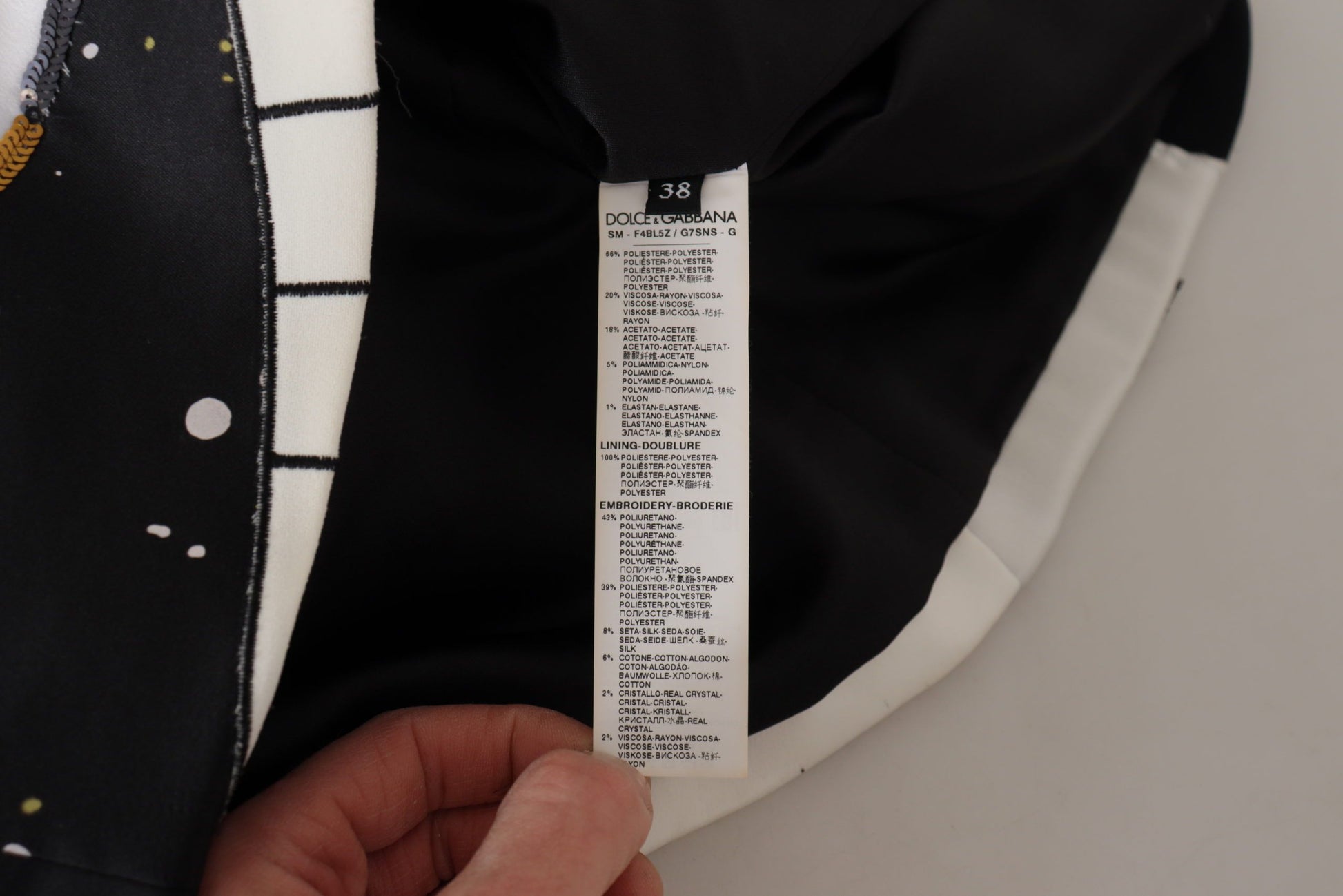 Black jacket with white stripes on sleeves