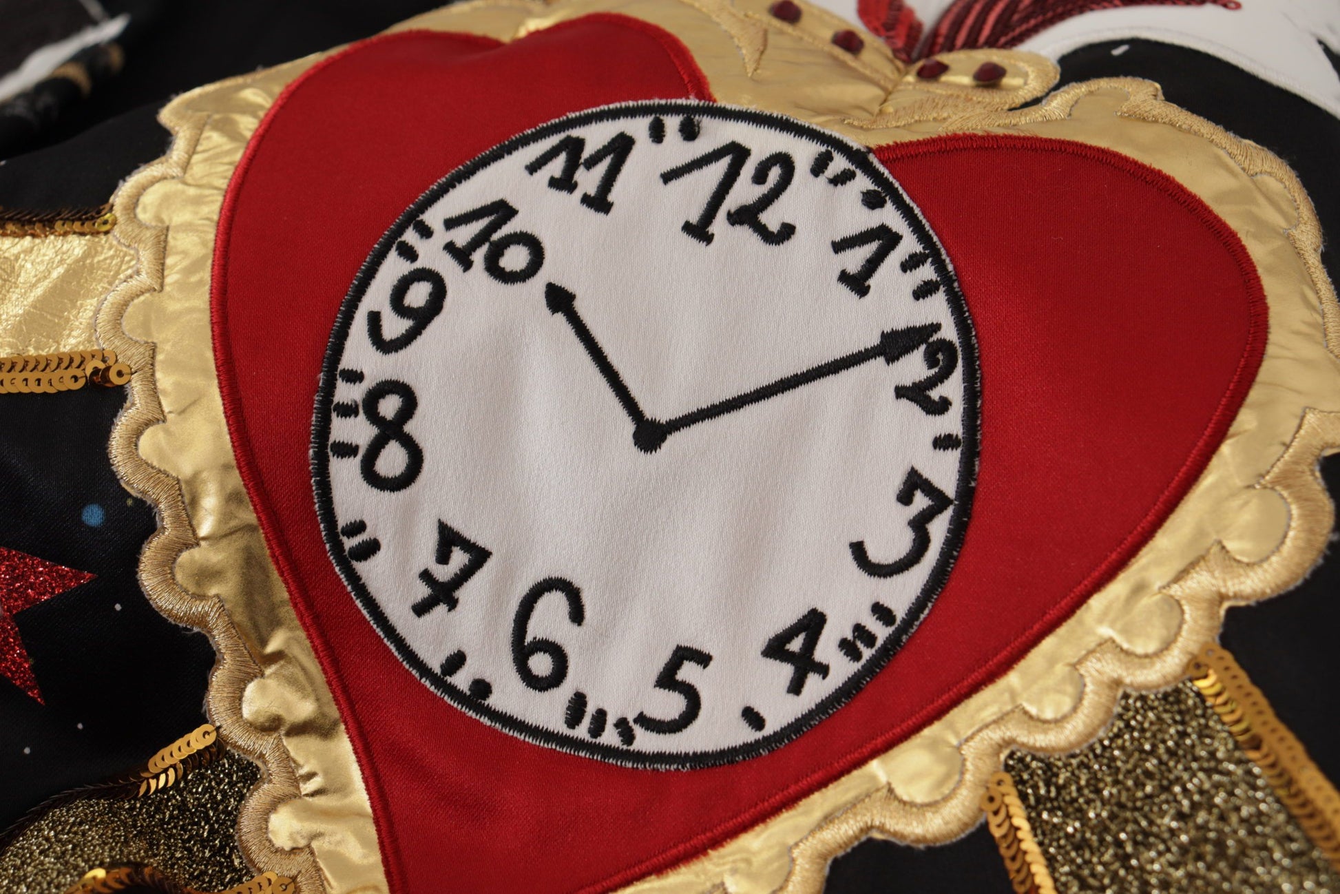Clock embroidered on a heart