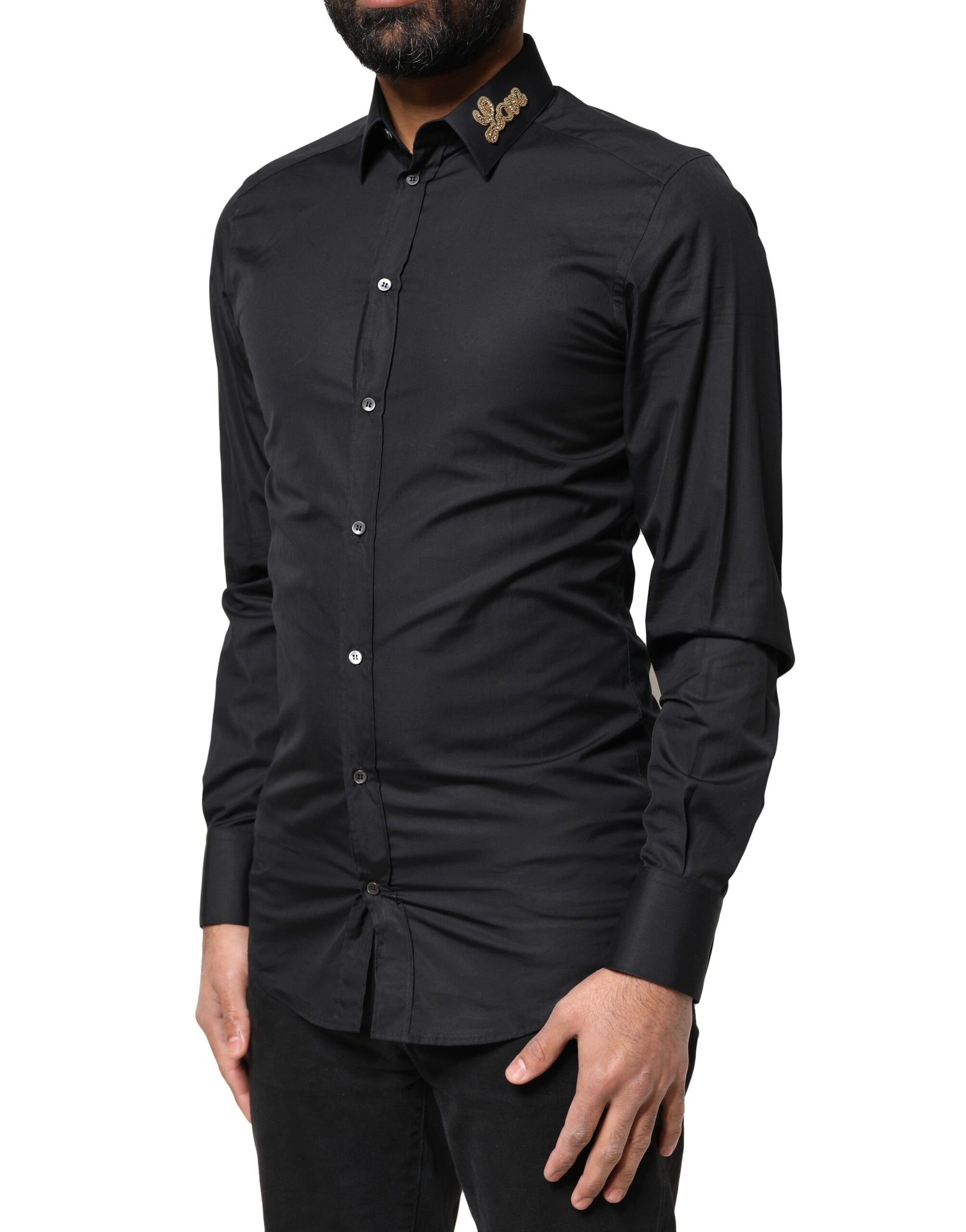 A black formal dress shirt with embroidered gold love design on the chest