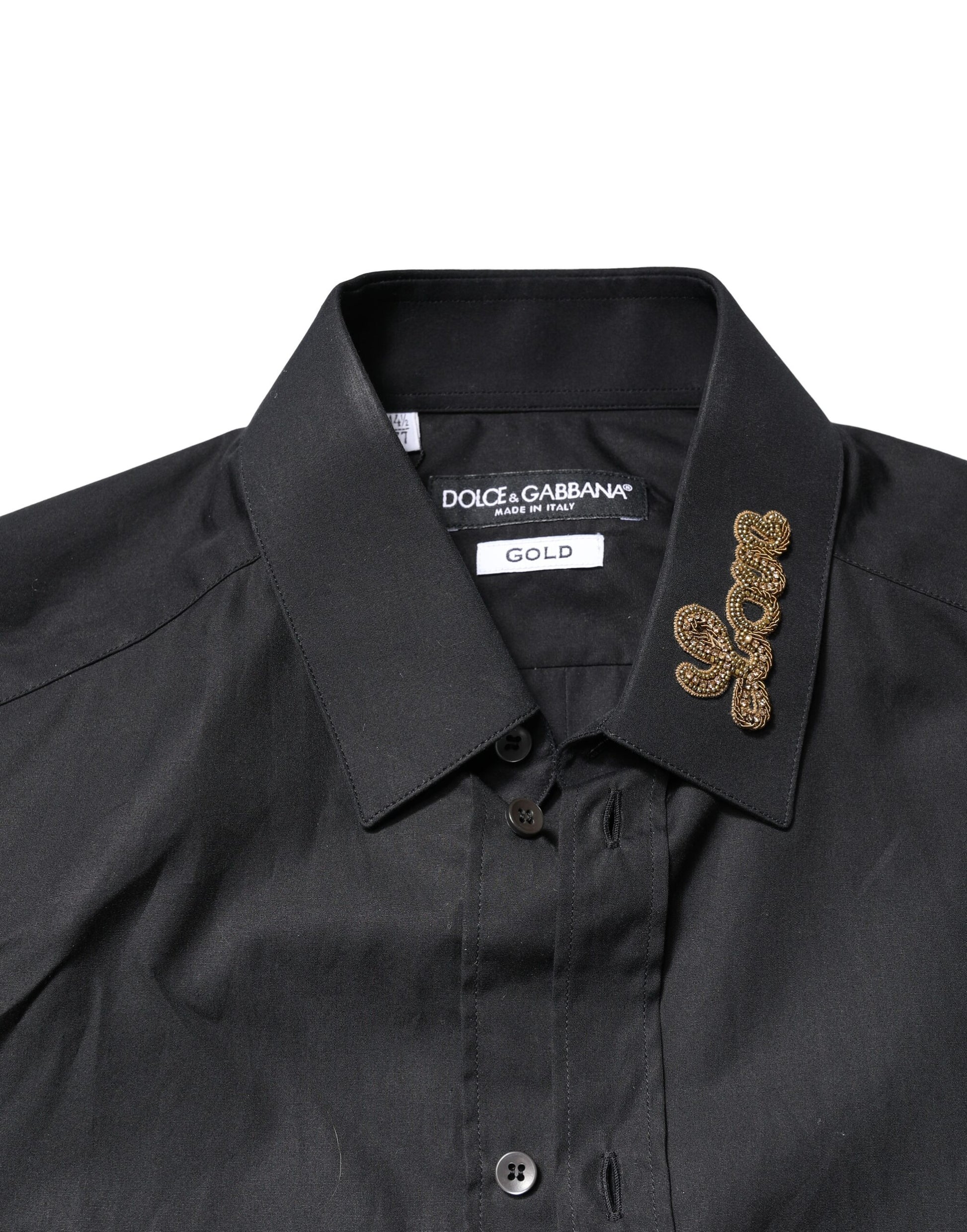 A black formal dress shirt with gold embroidery and a collar