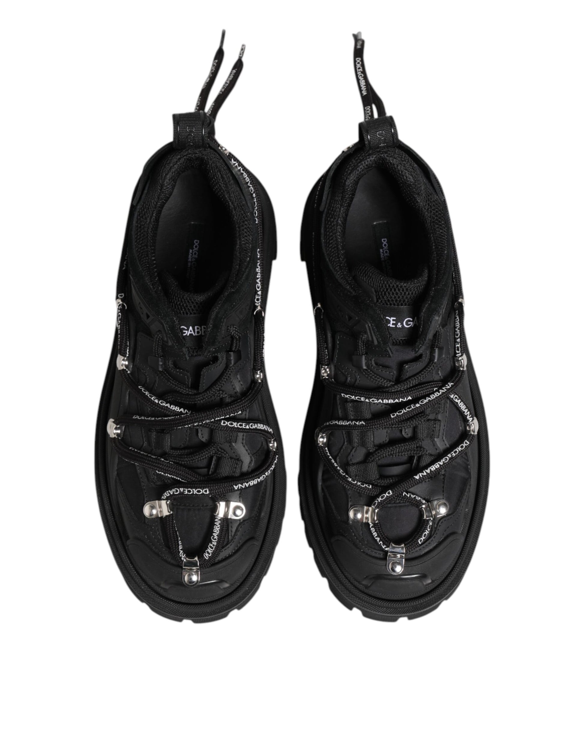 Pair of black hiking shoes with laces and straps