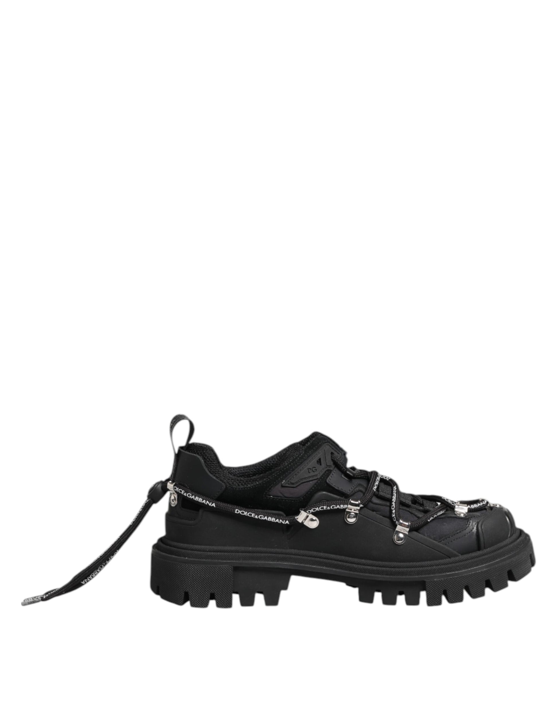 Black hiking boot with laces and metal studs on sole