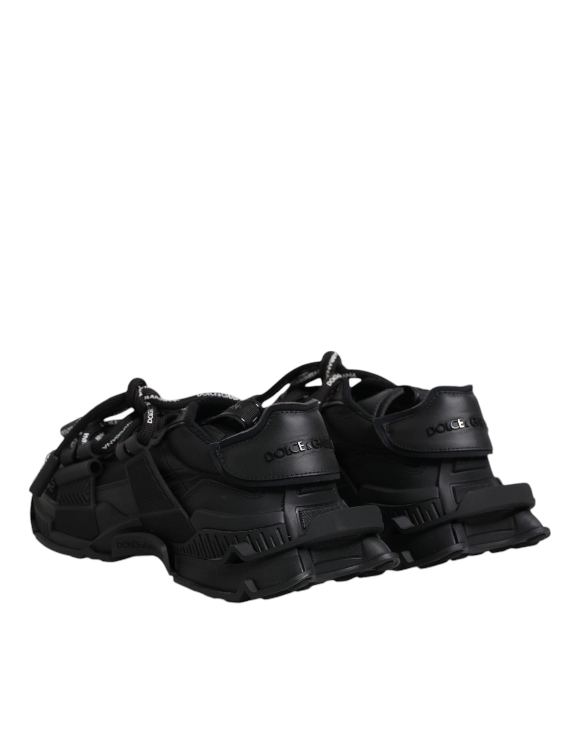 Pair of black hiking shoes with straps for ankle support