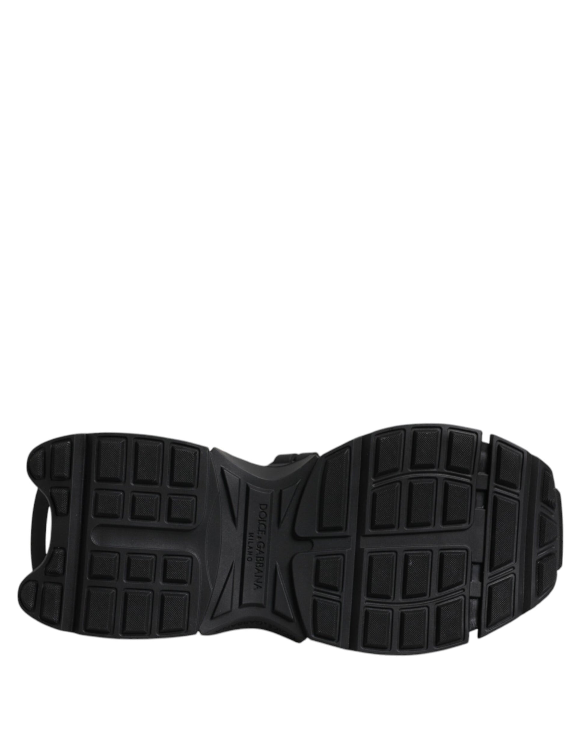 Black hiking boot with a deep tread pattern