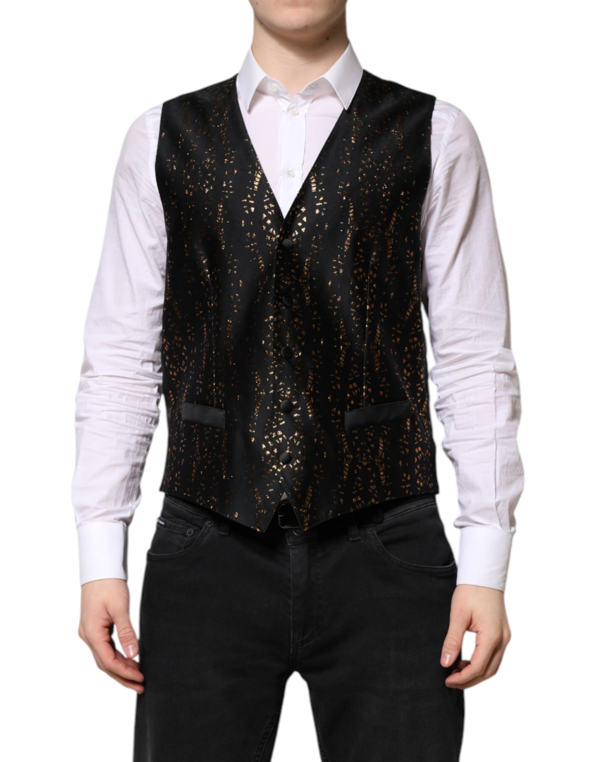 A black vest with gold sequins, part of a formal men's suit