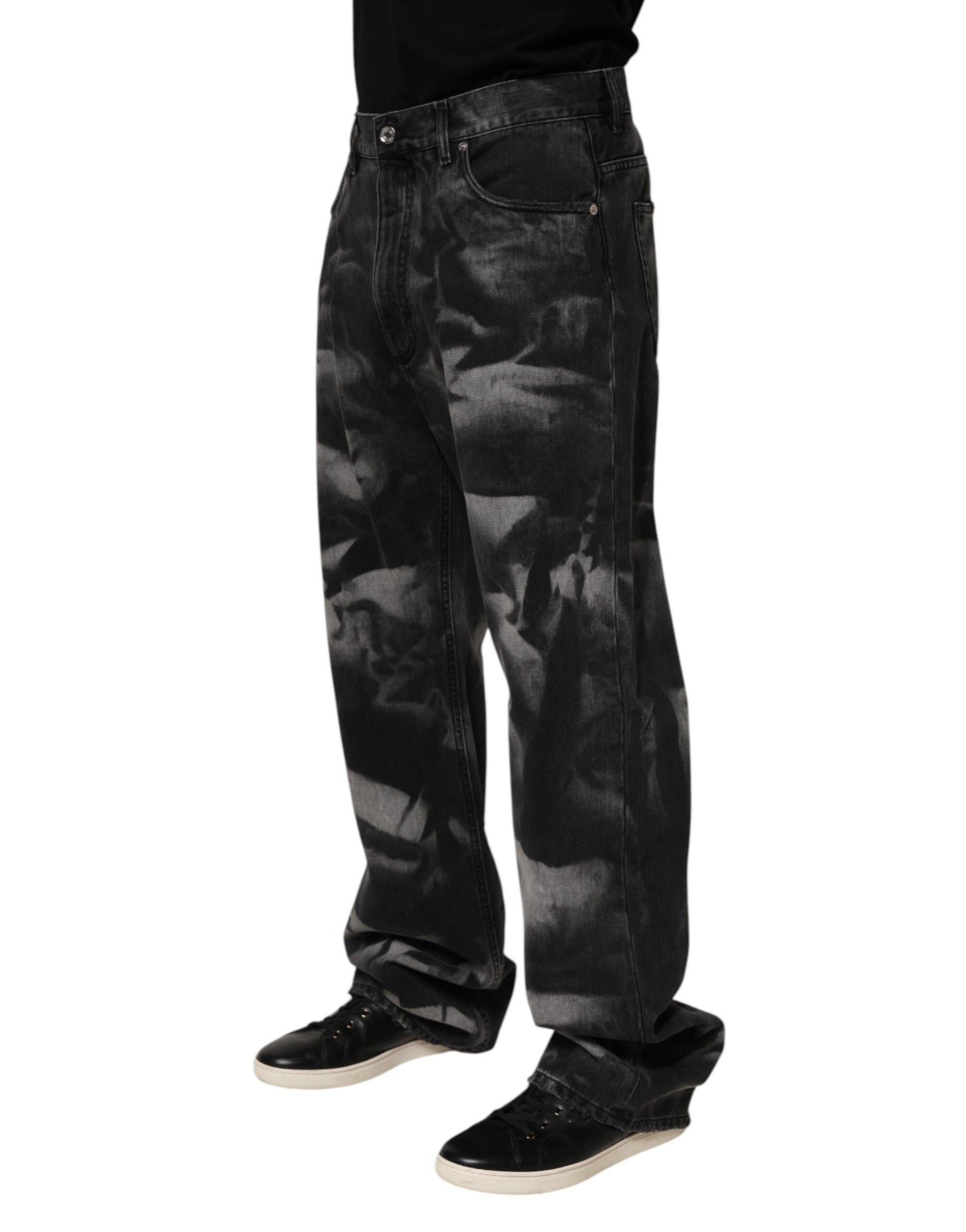 Man wearing jeans and black shoes