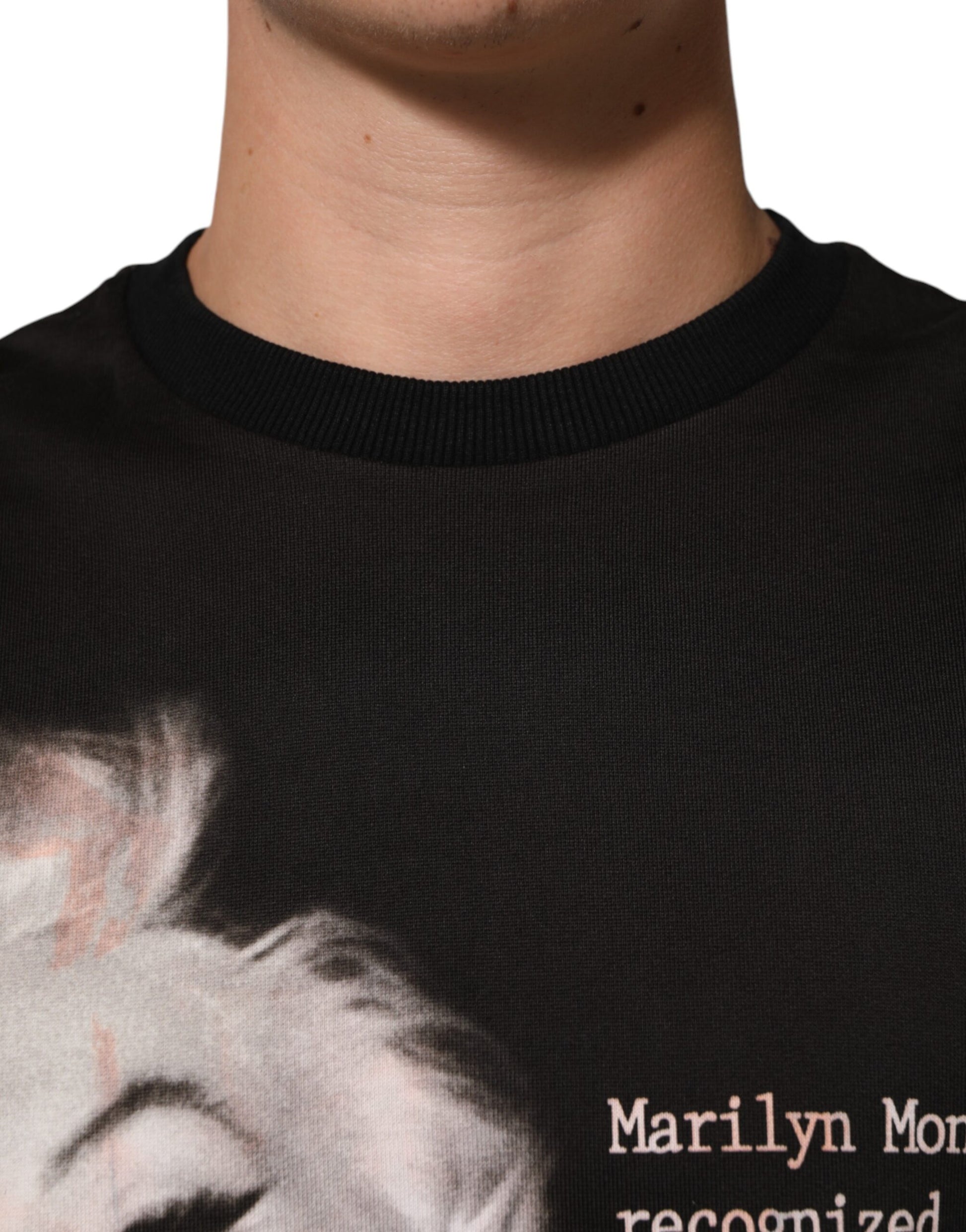 Black t-shirt with a graphic print of Marilyn Monroe's face
