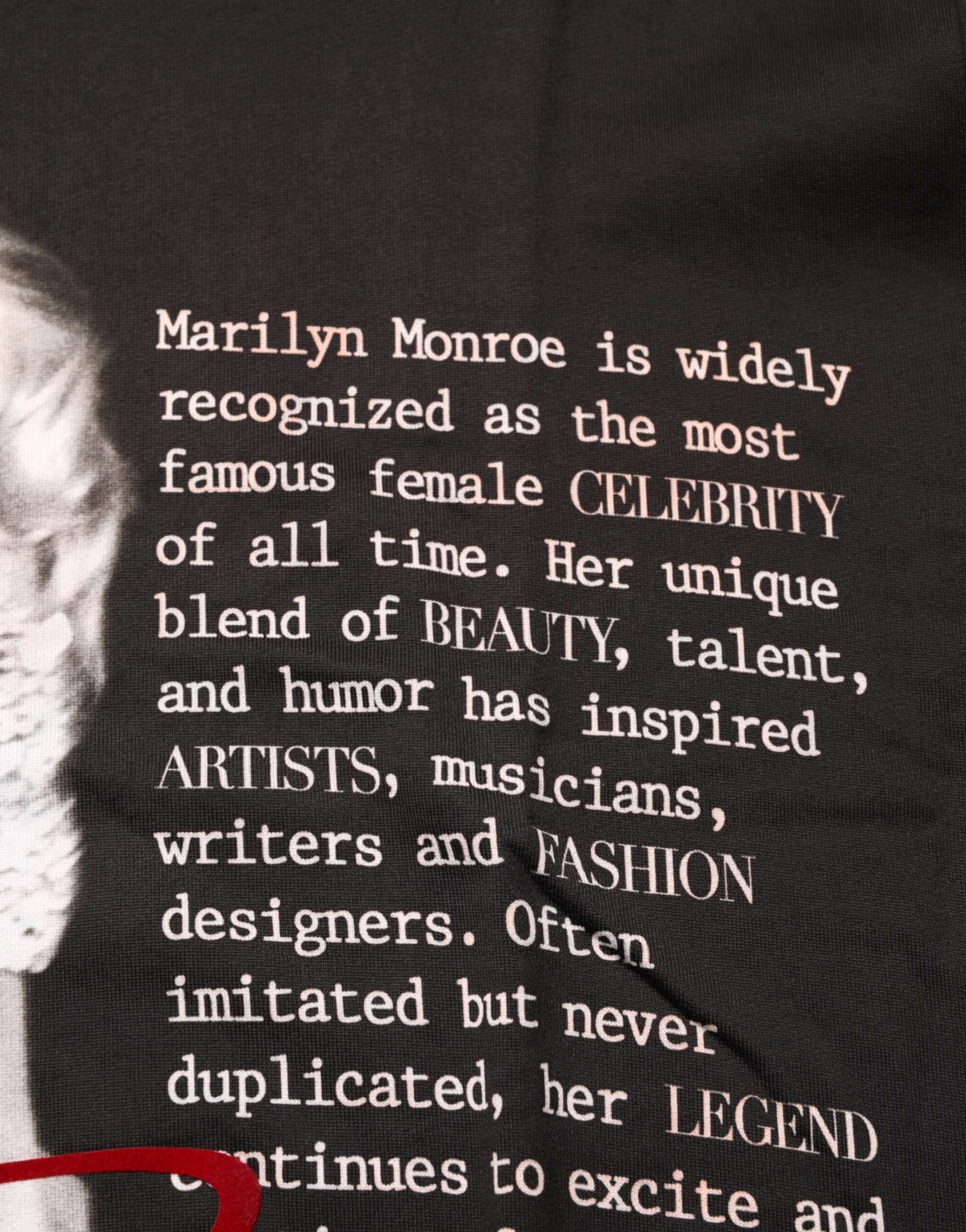 Black t-shirt with white lettering featuring a quote about Marilyn Monroe