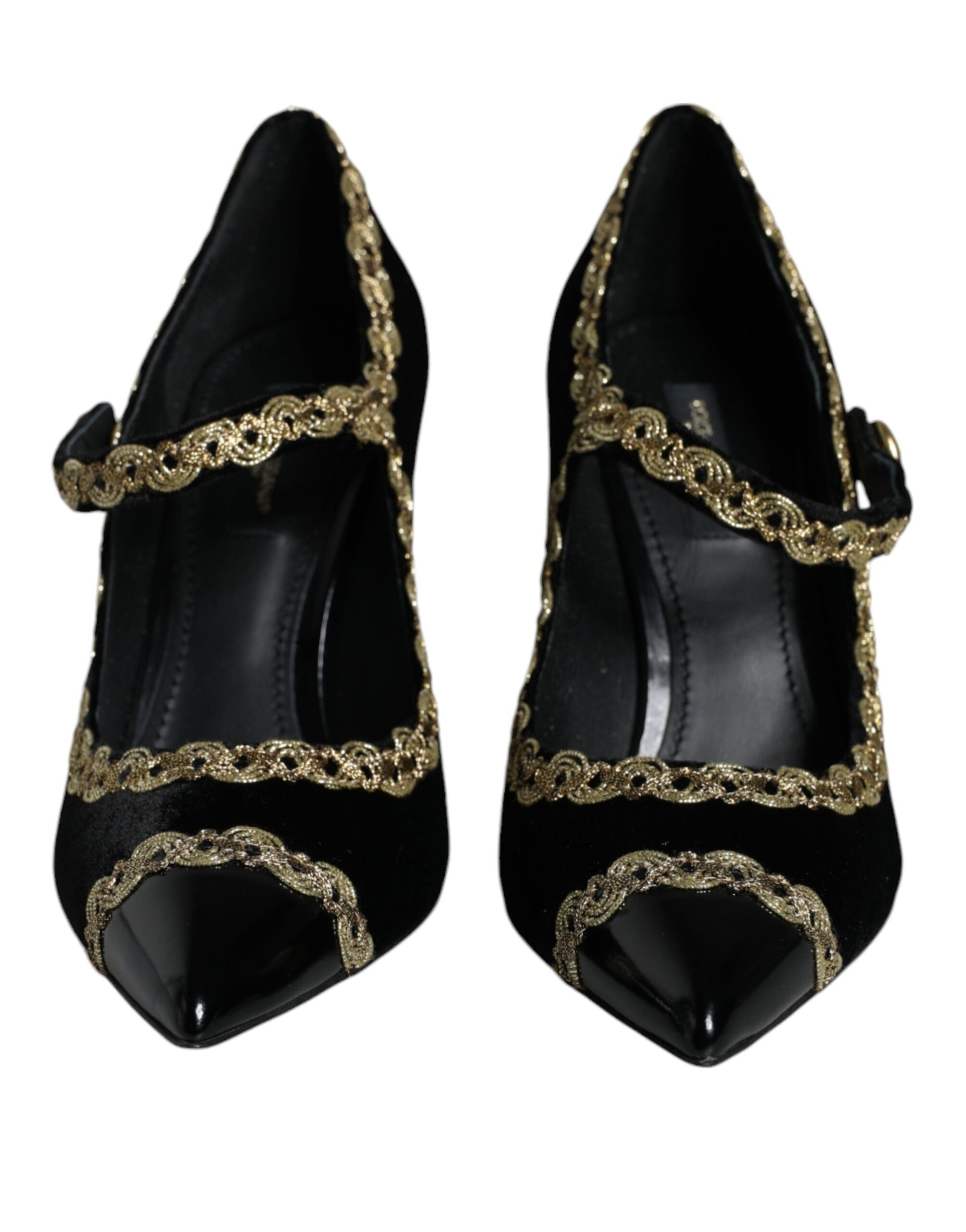 Pair of black shoes with gold accents