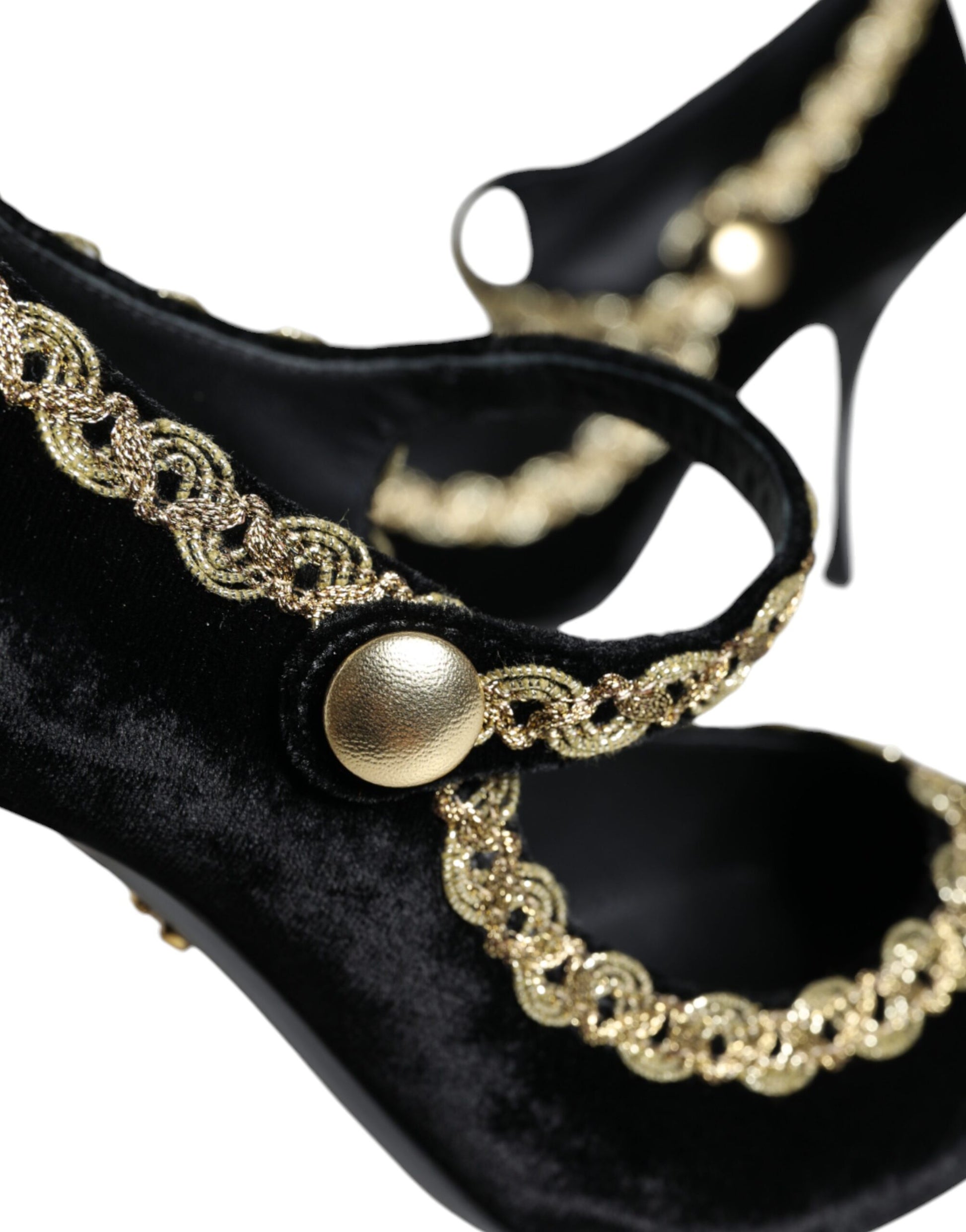 Black velvet shoe with gold embellishments