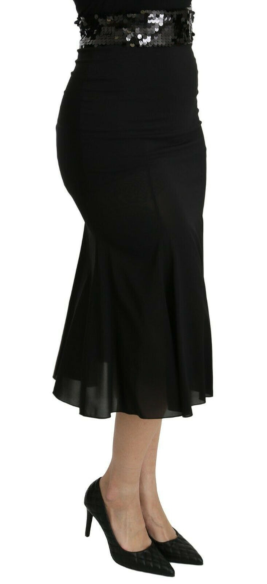 Long black dress with ruffles on sleeves