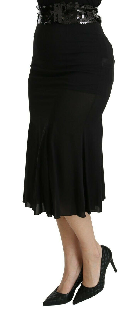Long black dress with ruffles on hem