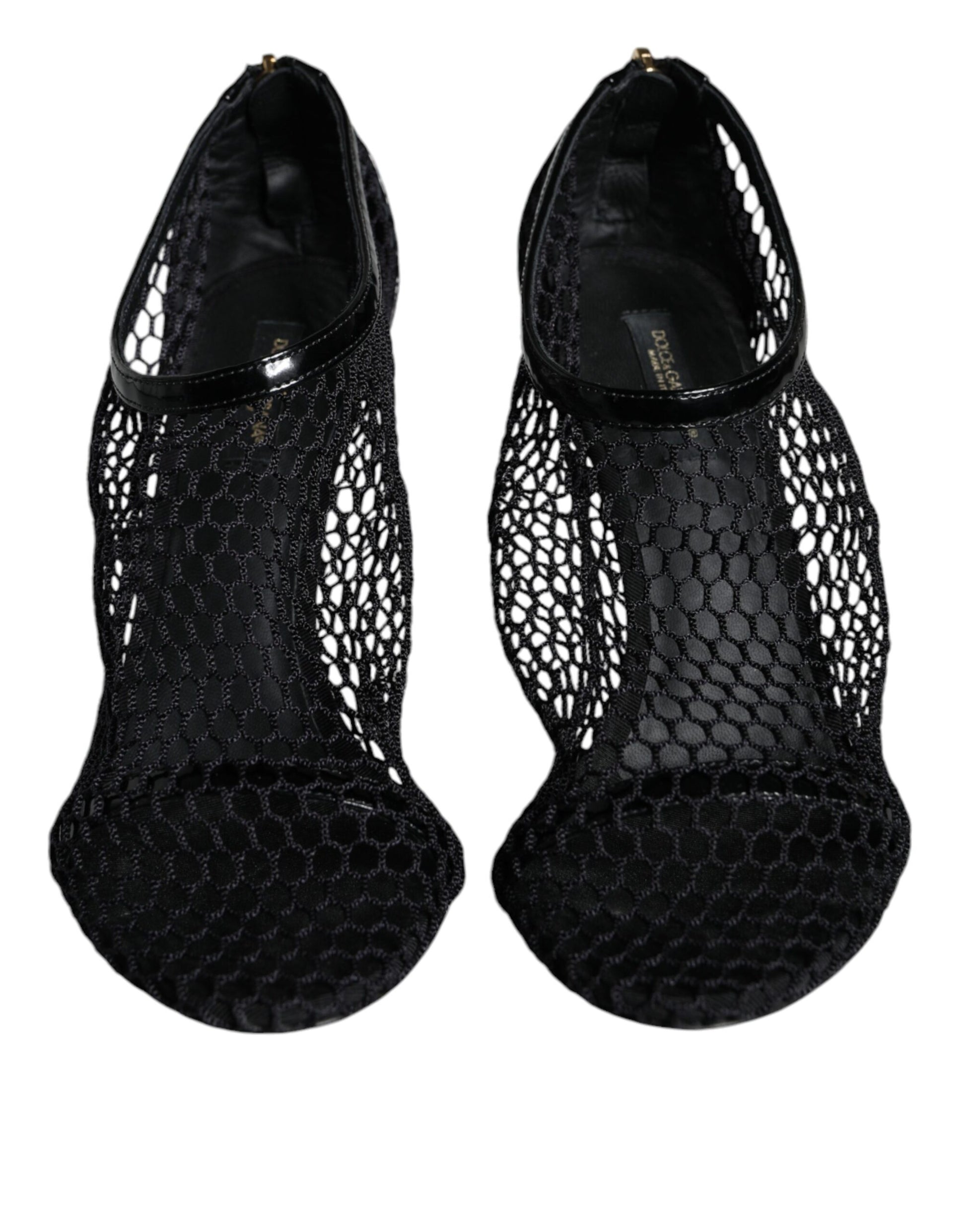 Pair of black high heel shoes with lace detailing