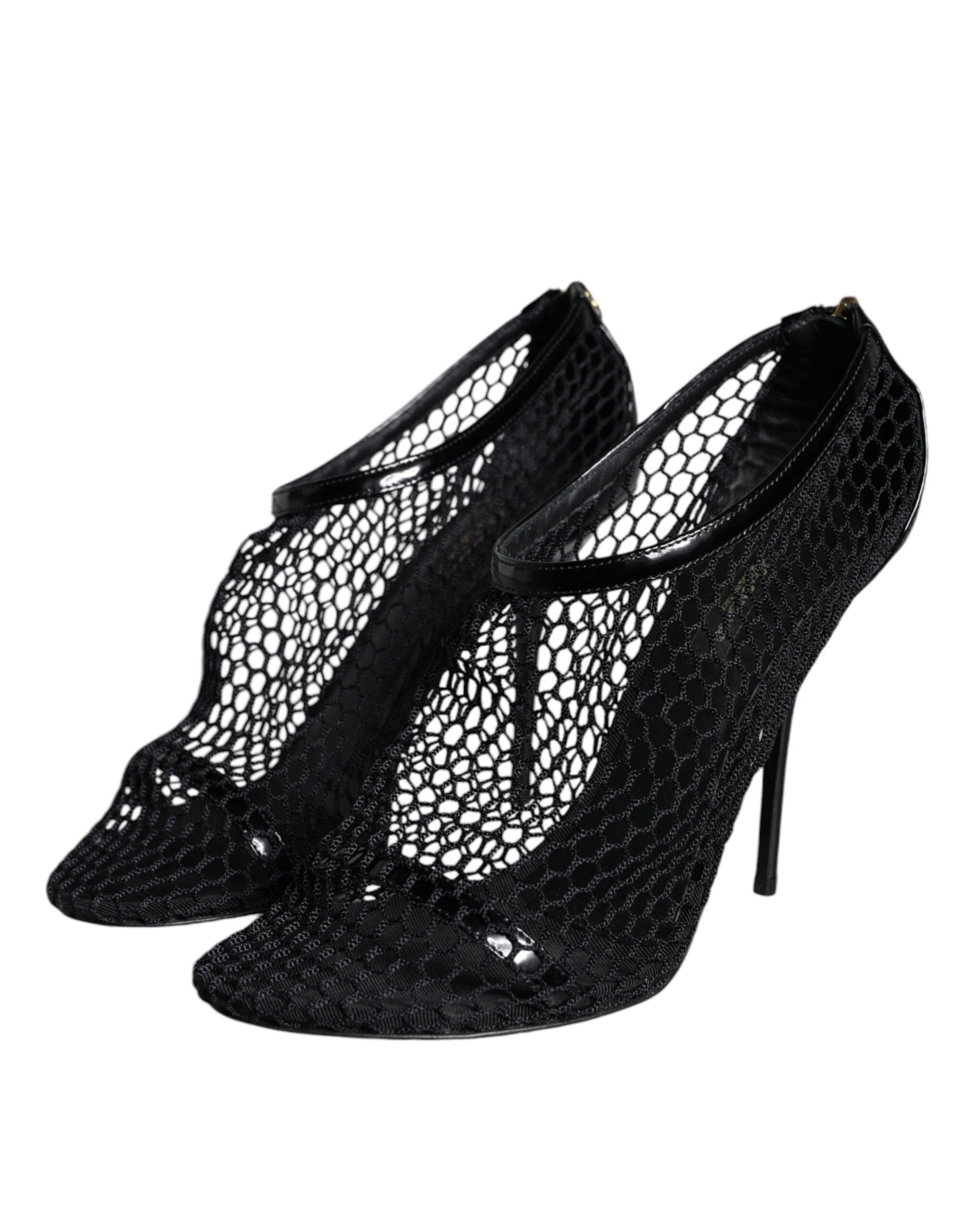 Pair of black high heel shoes with lace detailing