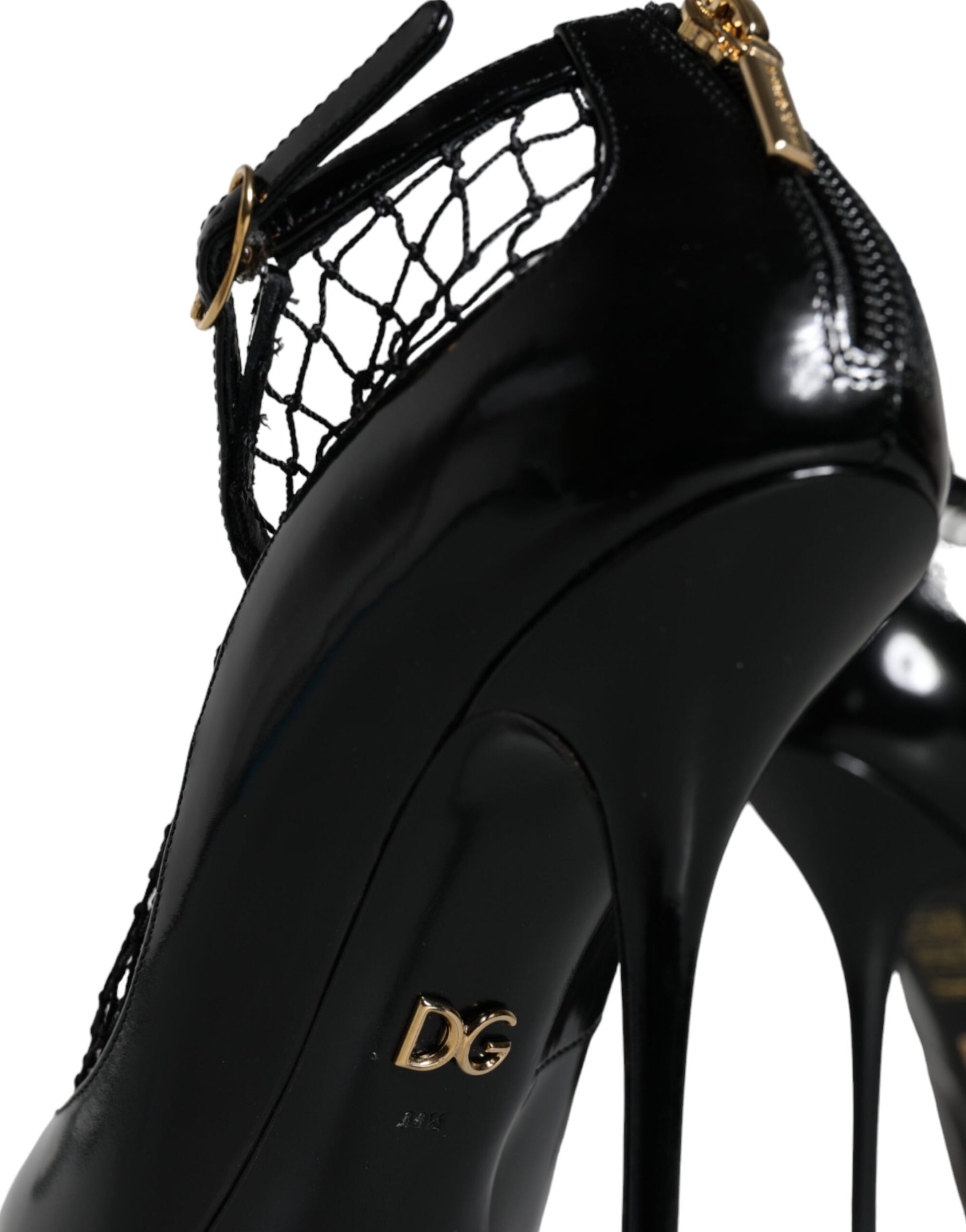 Black high heel shoe with gold accents