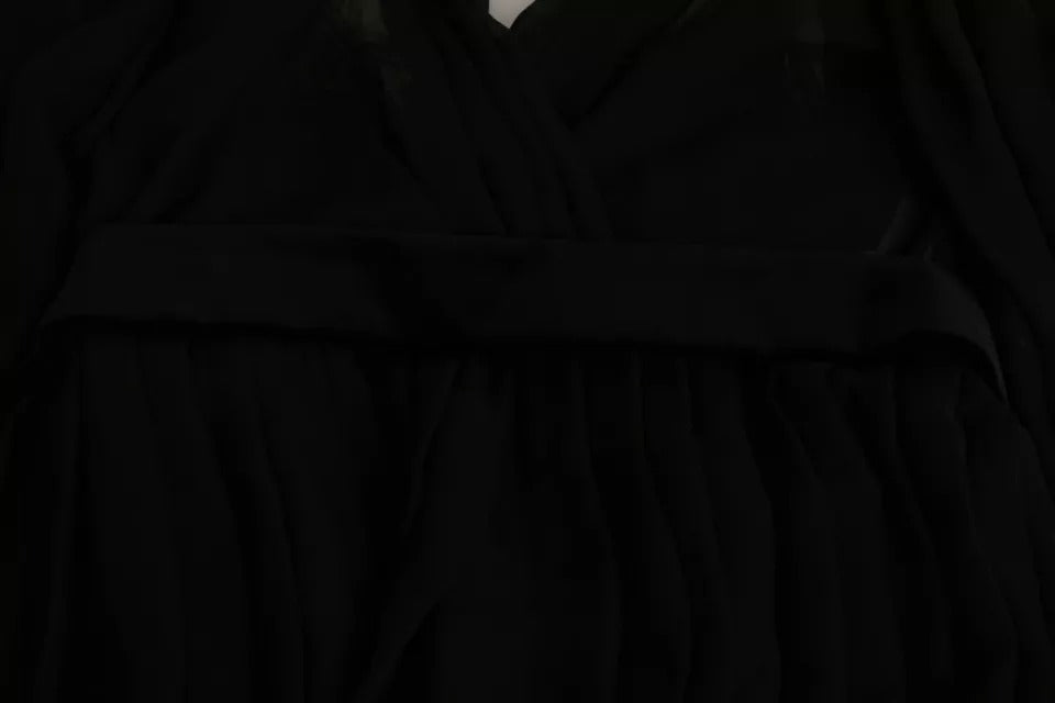 A black mesh pleated mini dress with a silk blend skirt